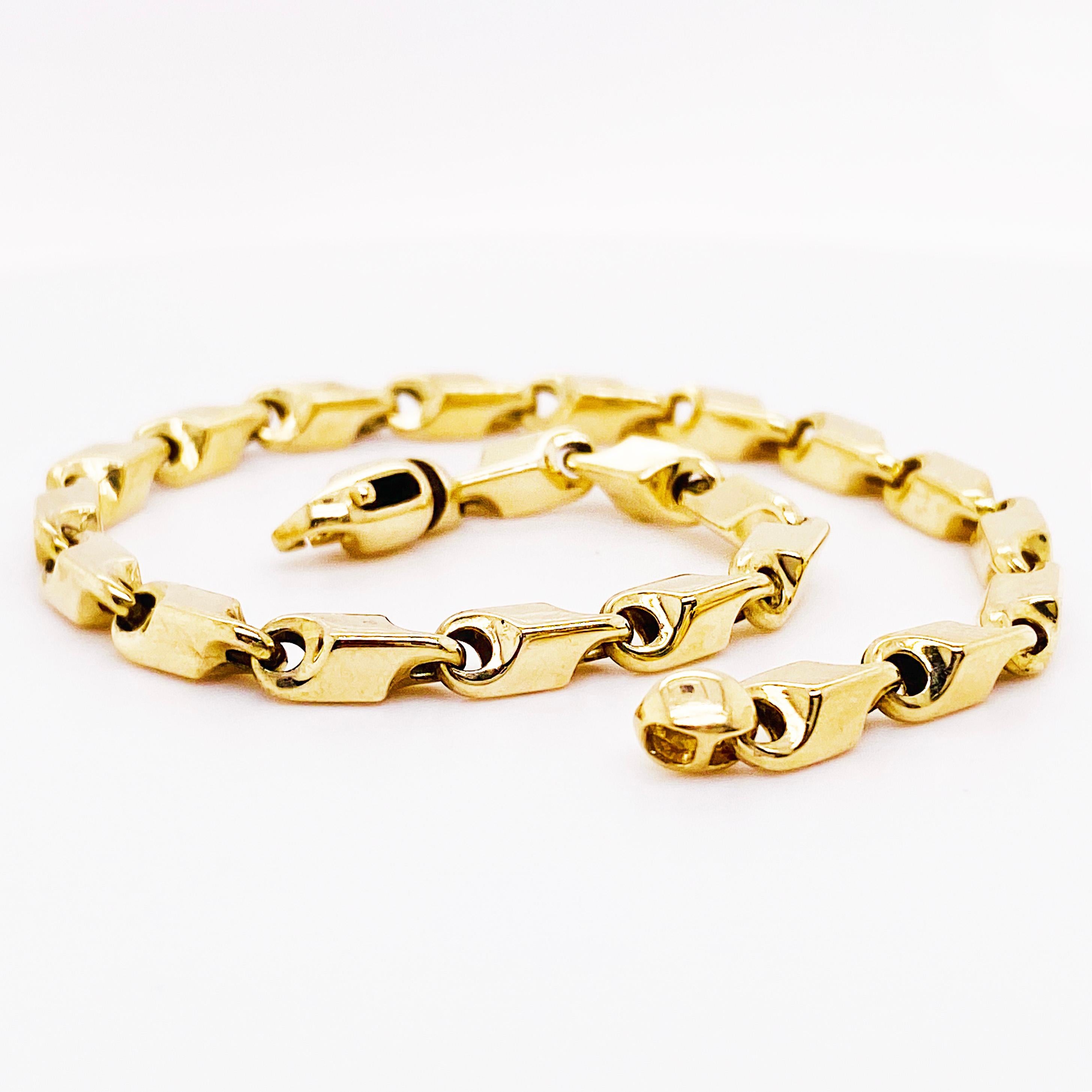 Das Grando-Gliederarmband aus 14 Karat Gelbgold.  Das Armband ist 8.25 Zoll lang.  Das Armband hat einen stabilen Durchmesser von 4,5 Millimetern.  Das Armband ist gestempelt 
