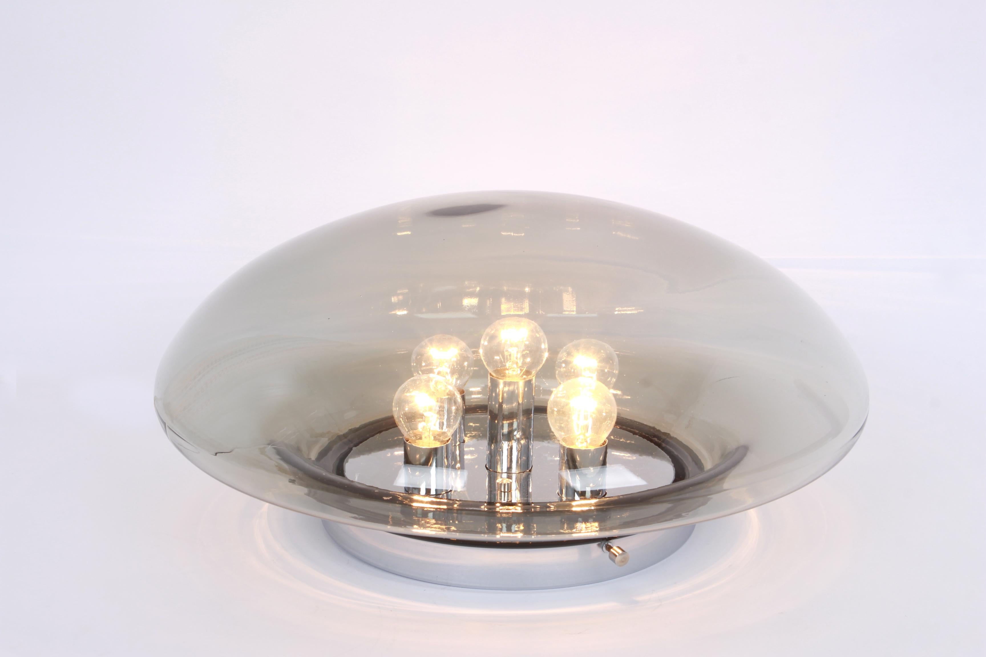 Large Gray/Green Glass flush mount manufactured by Limburg Glashütte Germany, circa 1960-1969. Wonderful spaceship form and a stunning light effect.

High quality and in very good condition. Cleaned, well-wired and ready to use. 

The fixture