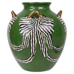 Large green Art Deco vase with bows in porcelain, France ca. 1930