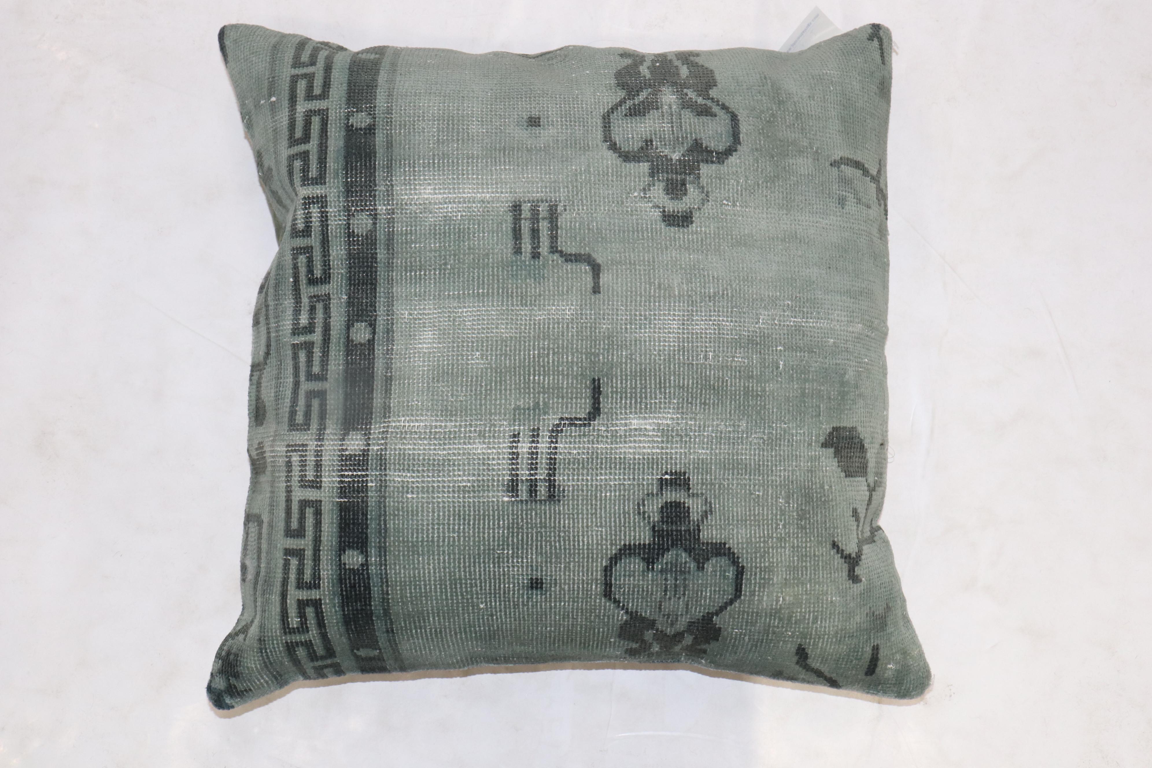 Pillow made from an old Chinese rug predominantly in green. zipper closure and polyfill provided

Measures: 23'' x 24''.