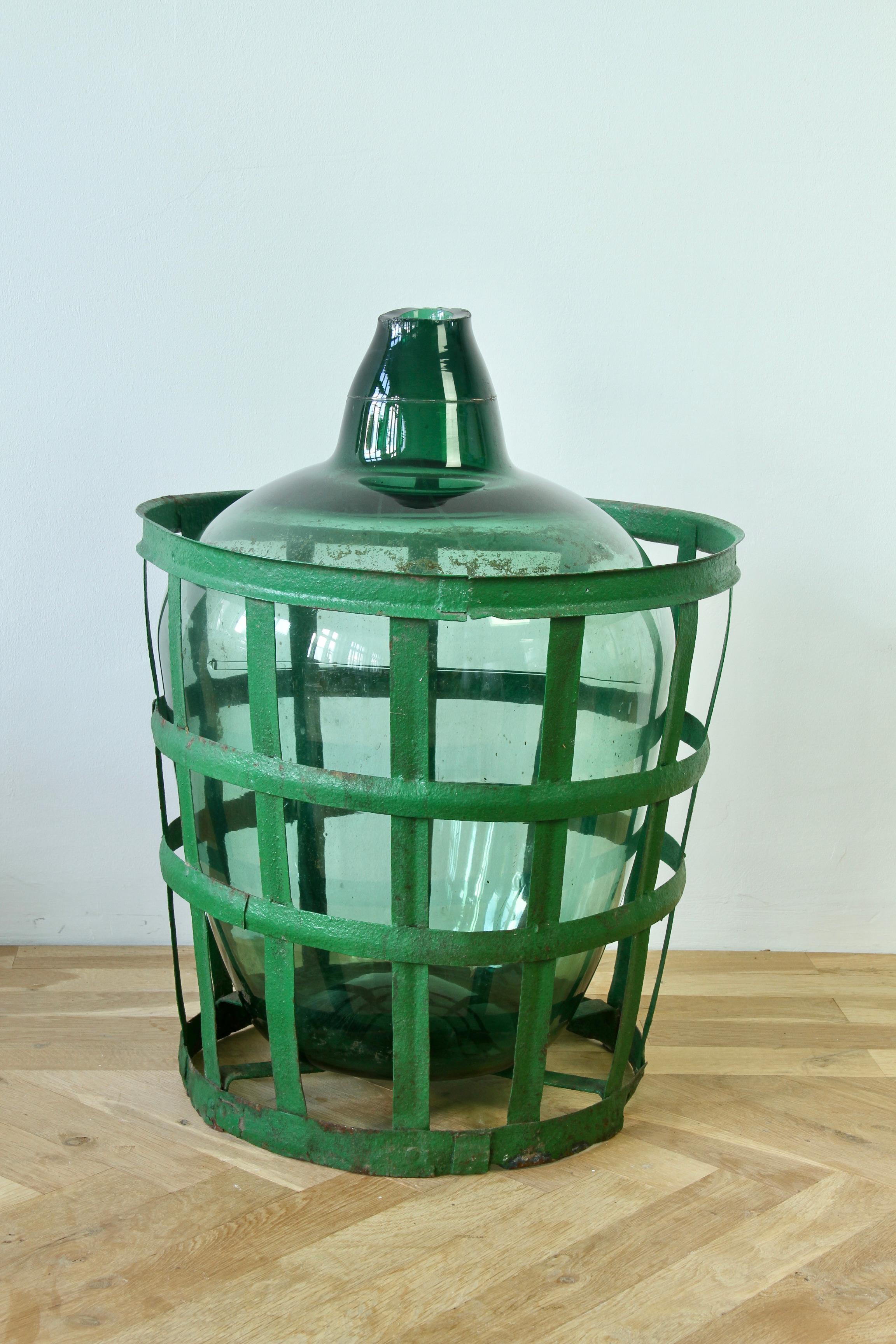 Large Green Glass Hungarian Demijohn, Amphora or Vase with Original Iron Basket For Sale 4