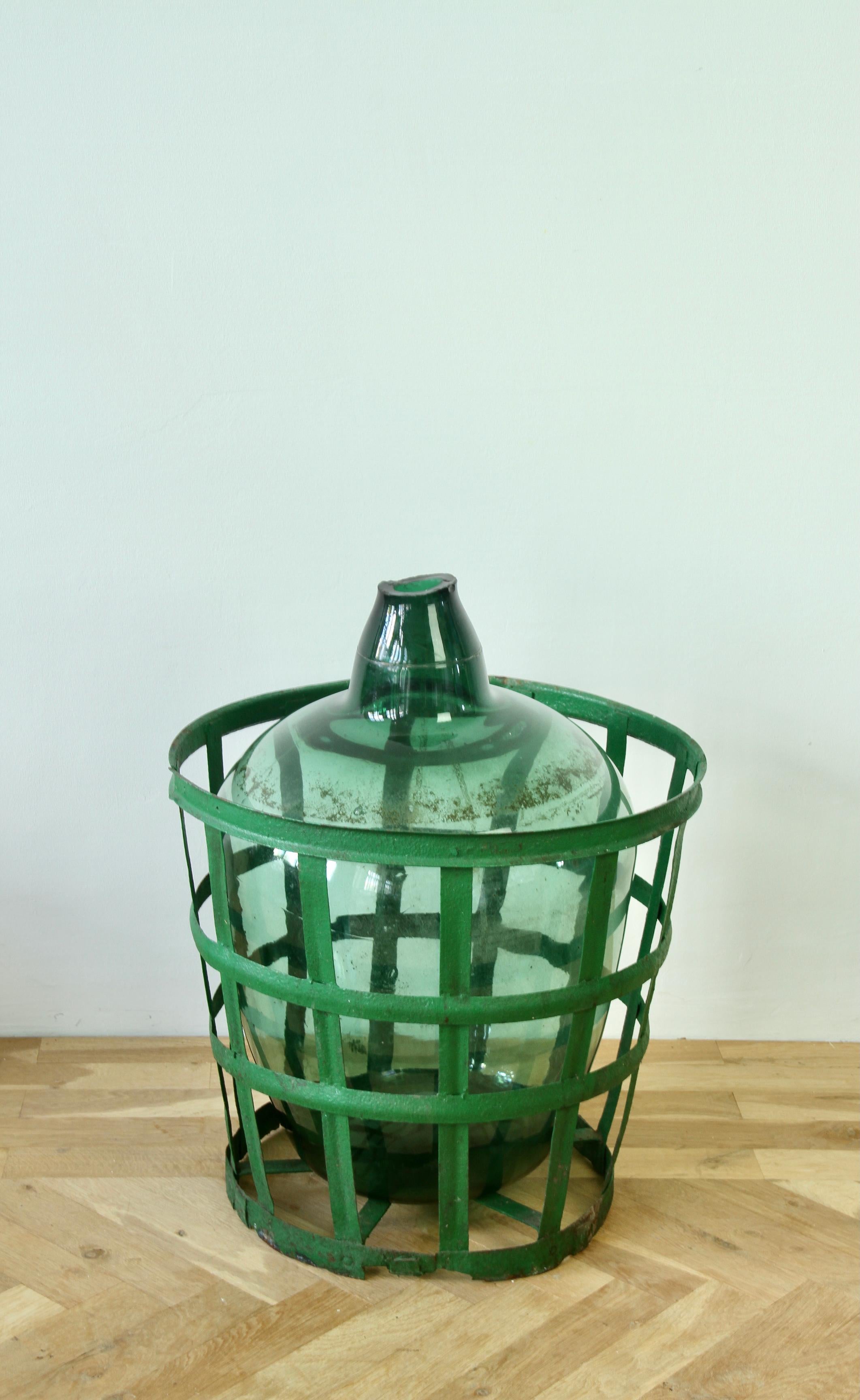 Large Green Glass Hungarian Demijohn, Amphora or Vase with Original Iron Basket For Sale 2