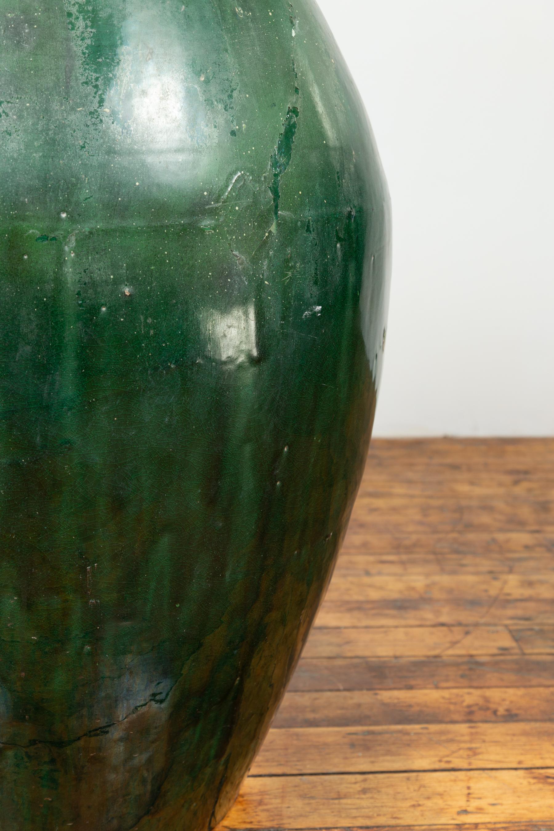 Asian Large Green Glazed Ceramic Jar from the Early 20th Century with Tapering Body