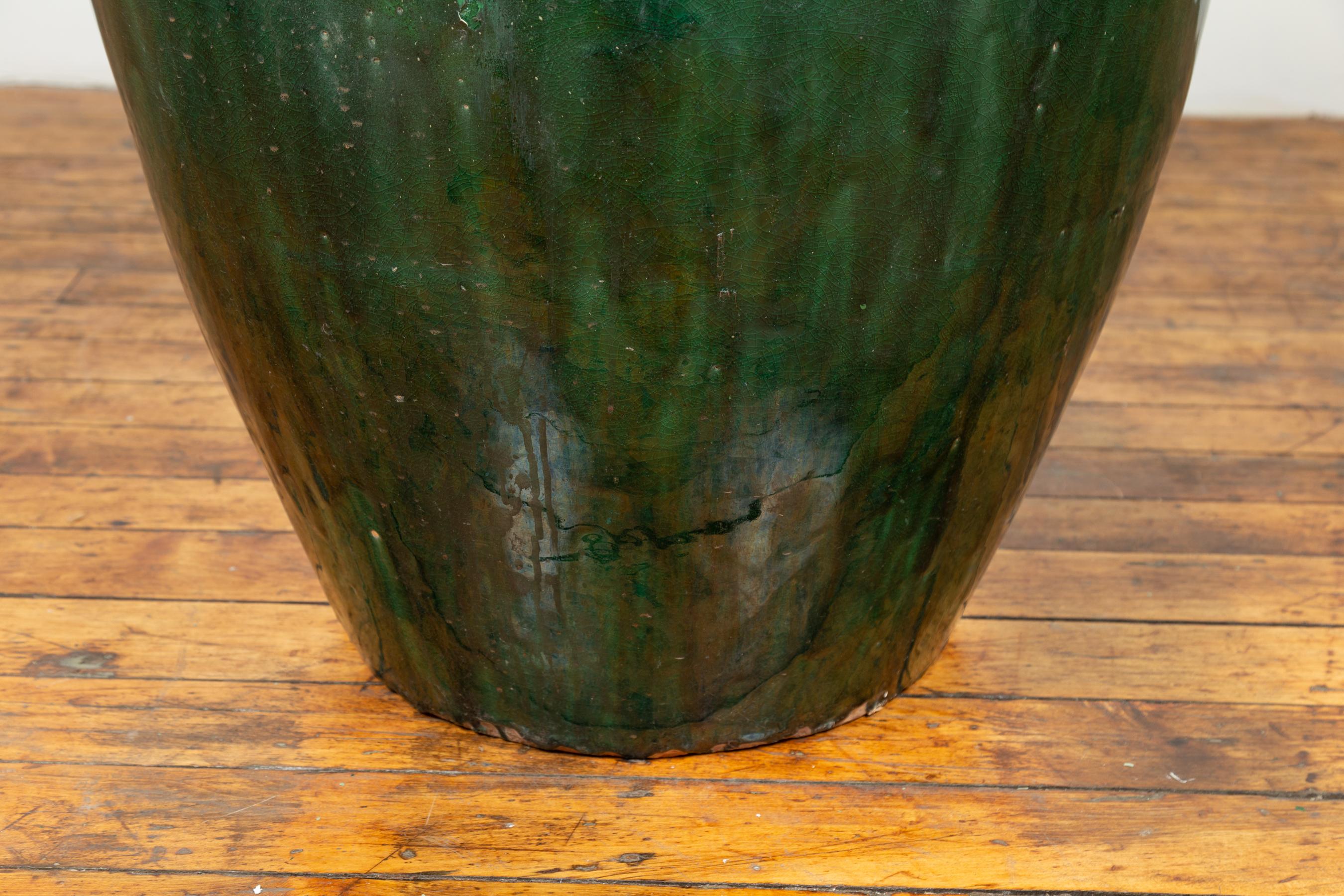 Large Green Glazed Ceramic Jar from the Early 20th Century with Tapering Body In Good Condition For Sale In Yonkers, NY