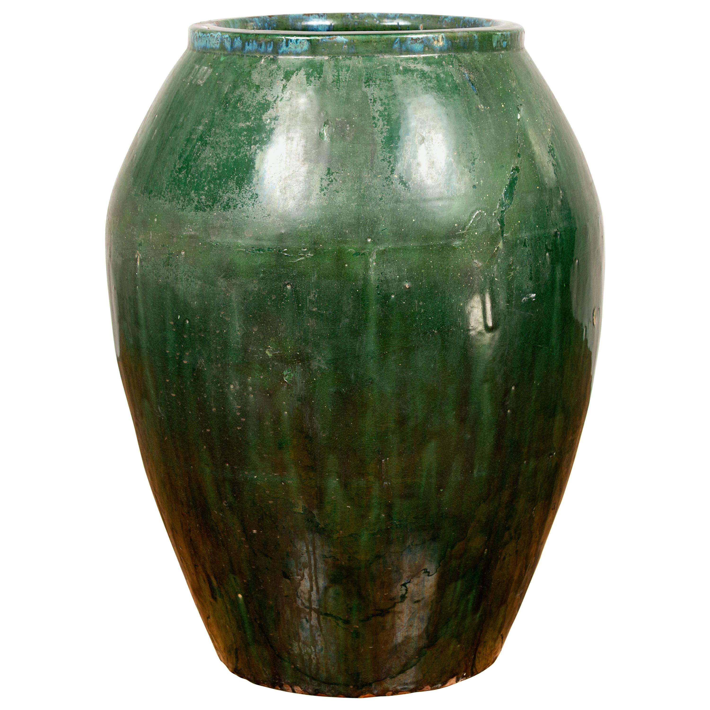 Large Green Glazed Ceramic Jar from the Early 20th Century with Tapering Body