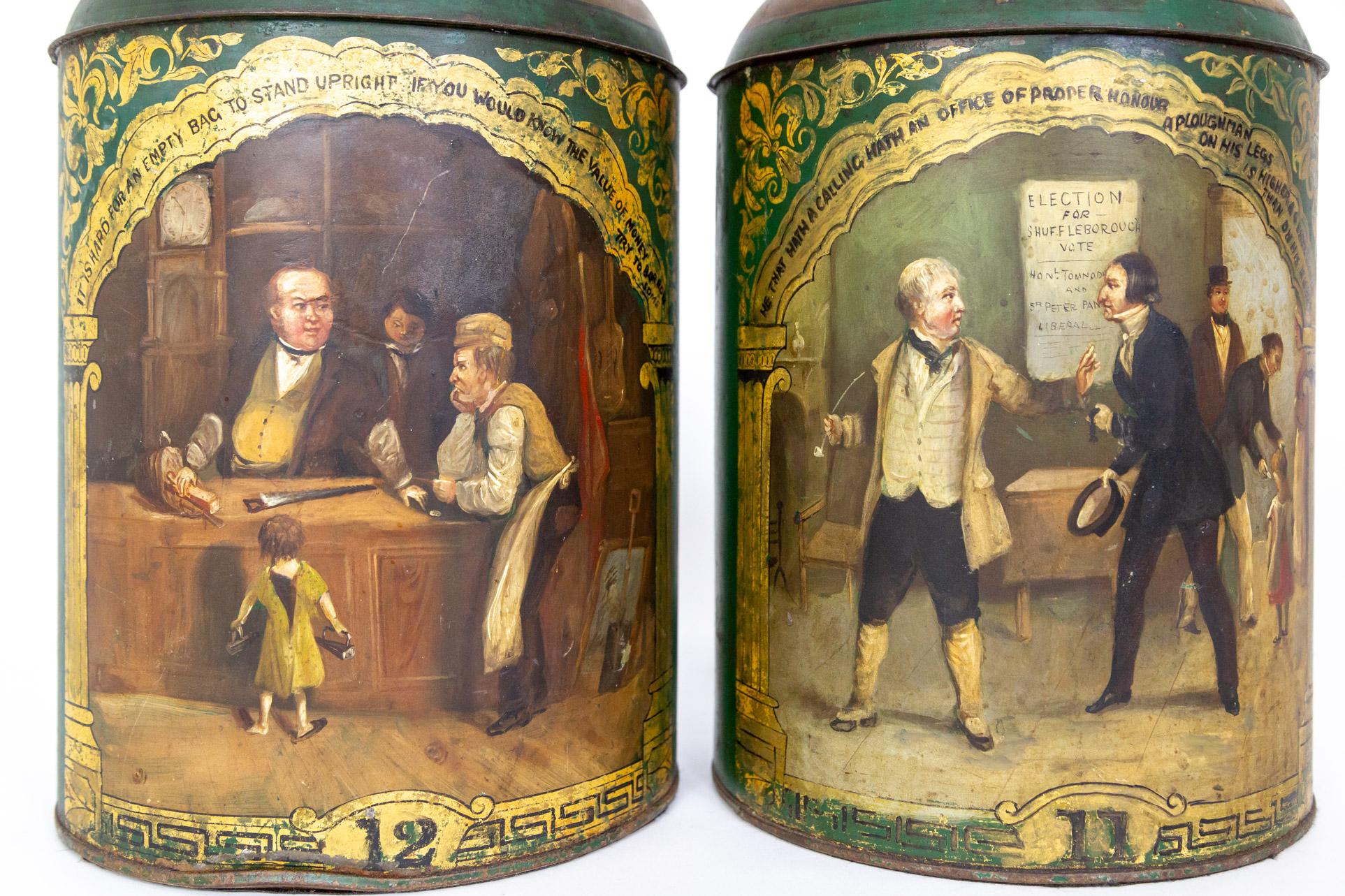 A pair of late 1800s tole tea tin canisters made into table lamps. They are green with gold trim and finely hand-painted genre scenes in the centers. Newly rewired with dimmers on the sockets. 23