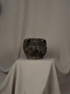 Large green heavily textured vessel