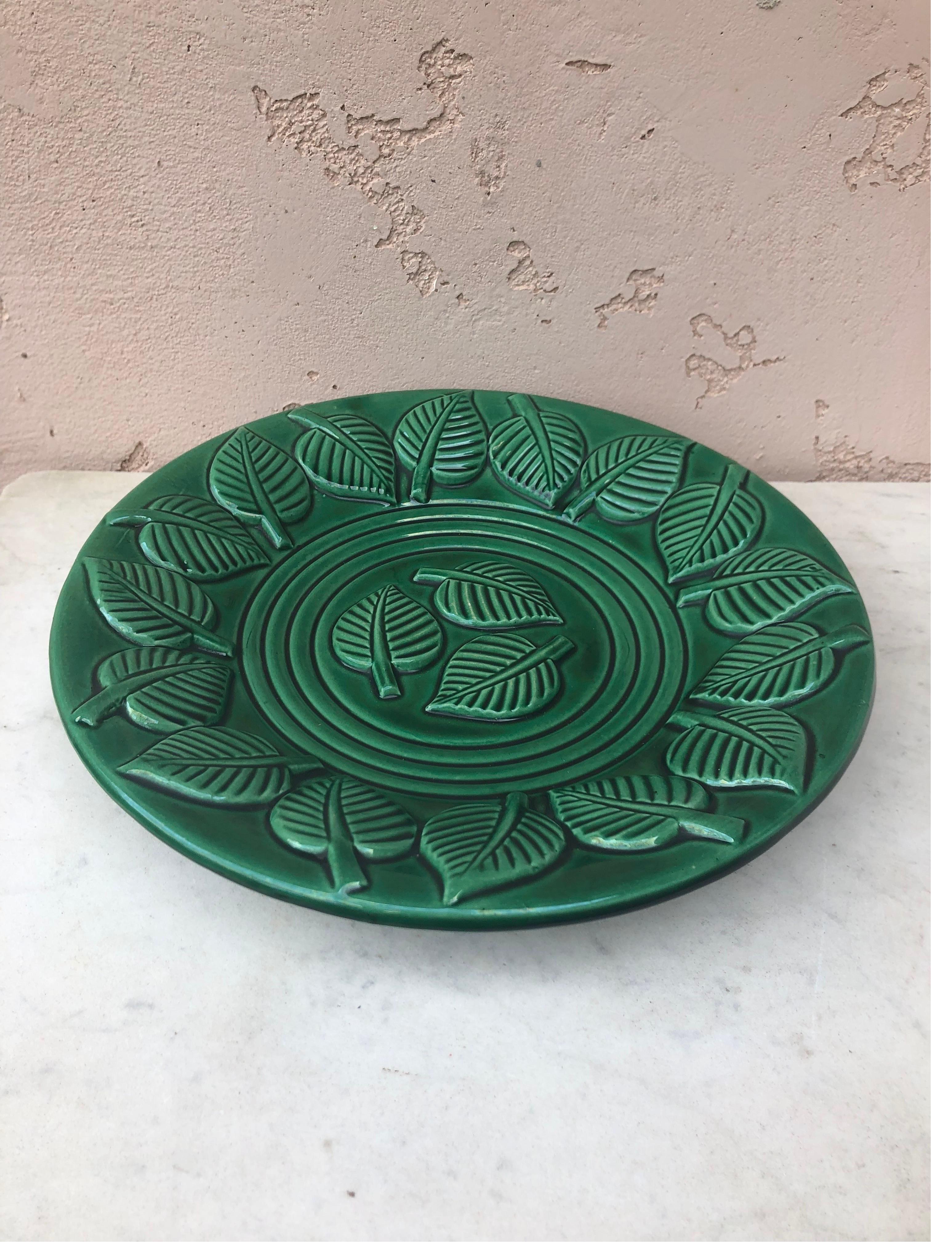 Large green majolica platter or bowl with leaves signed B-Letalle Saint Clement Circa 1950.