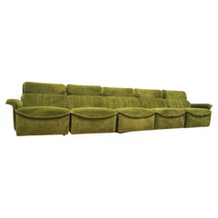 Large green velvet vintage element sofa made in the 1970s
