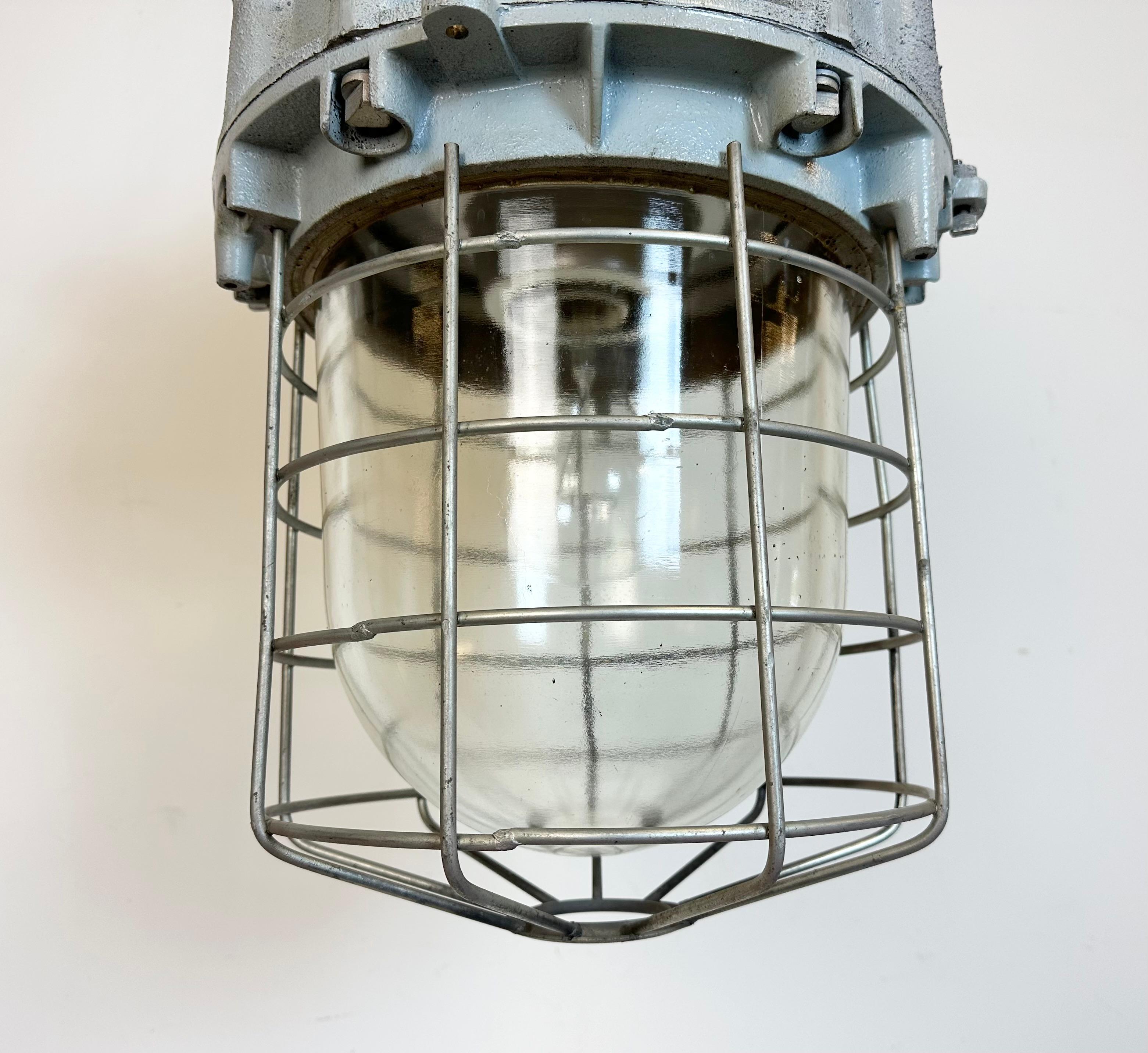 Large Grey Industrial Bunker  Light with Iron Cage from Elektrosvit, 1970s In Good Condition For Sale In Kojetice, CZ