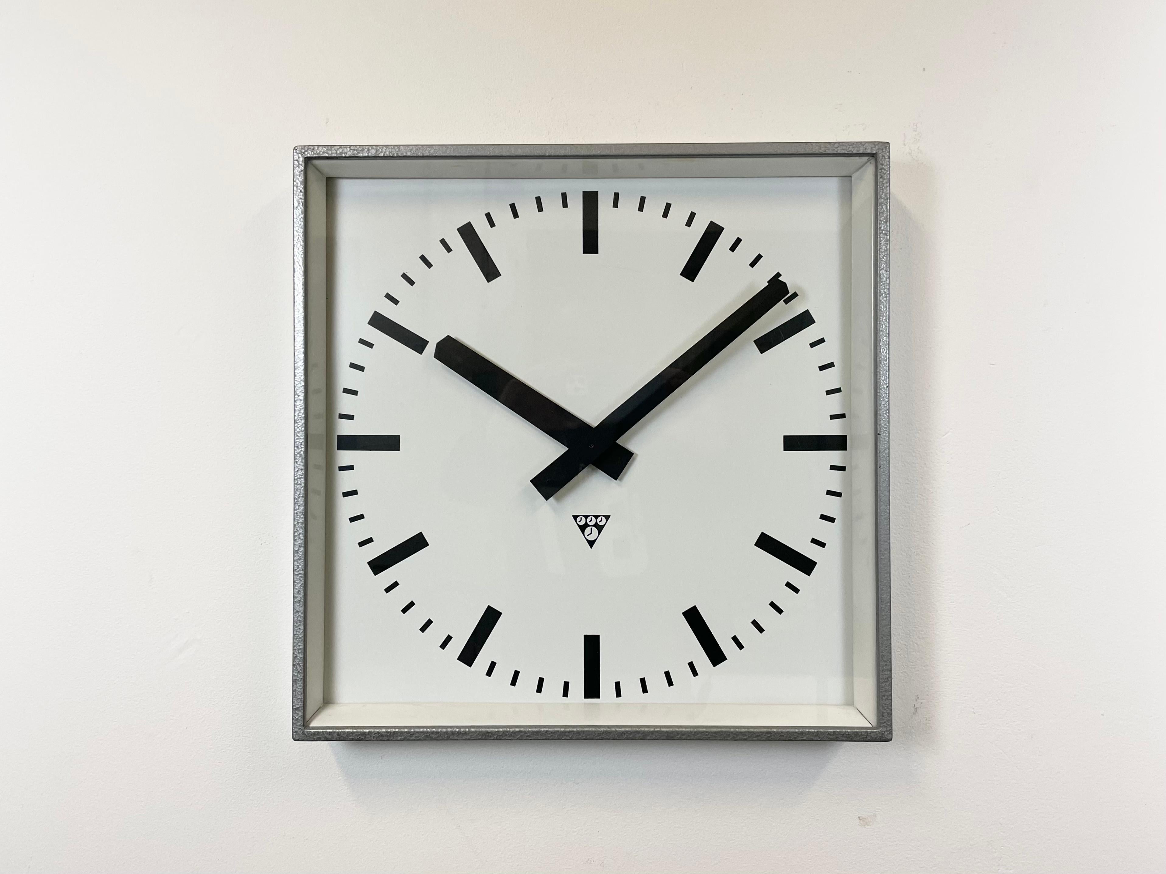 - Clock made by Pragotron in former Czechoslovakia during the 1970s.
- Was used in factories, schools & railway stations
- Features a gray hammer paint finish metal body, aluminum dial, clear glass
- Has been converted into a battery-powered