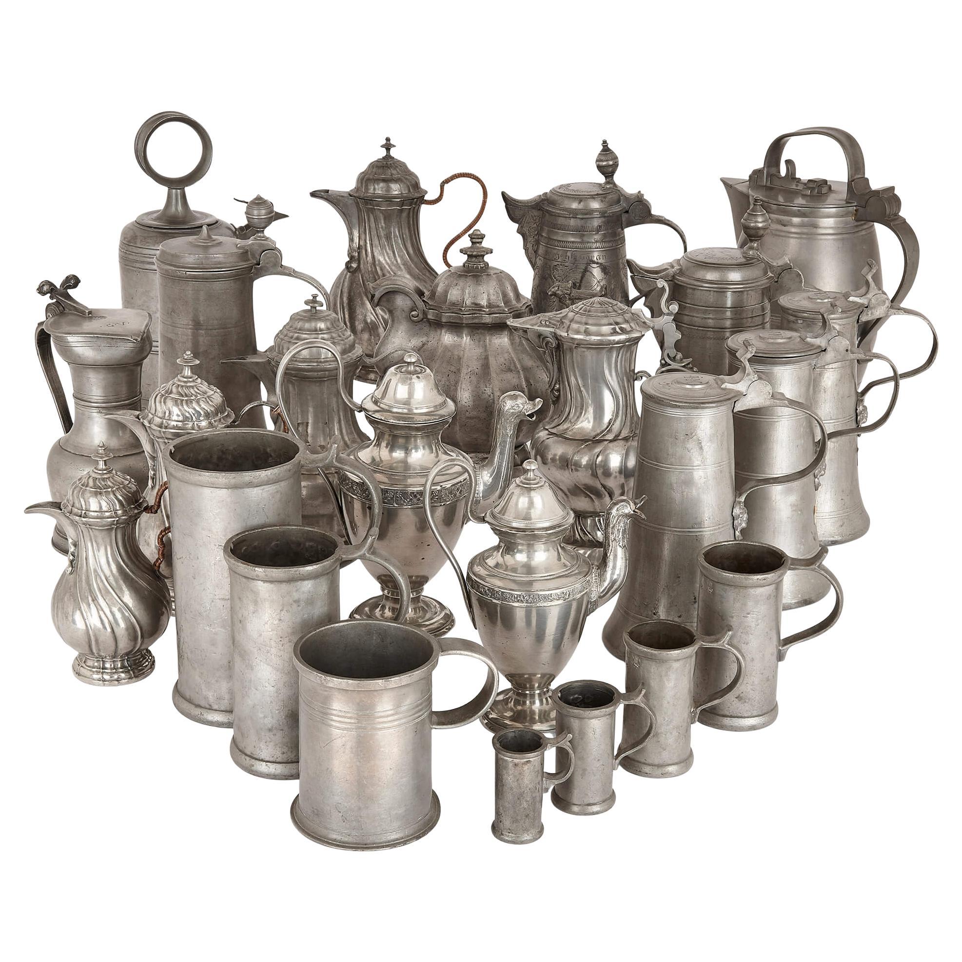 Large Group of Antique German Pewter Mugs, Tankards, and Ewers For Sale