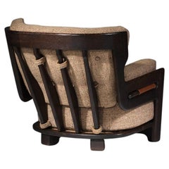 Large Guillerme and Chambron armchair in stained oak with sand-colored fabric