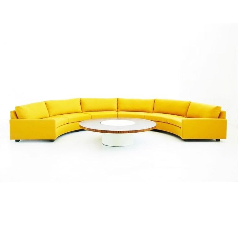 Clean, Minimalist two-piece semi circular sofa, model no 825 designed by Milo Baughman for Thayer Coggin, circa 1968. Comfortable deep seats and low slung profile. Newly upholstered in a yellow fabric with loose back and seat cushions resting on