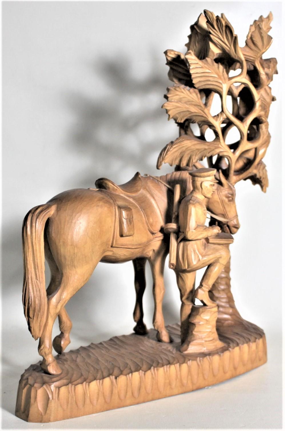 German Large Hand Carved Black Forest Military Soldier & His Horse Under a Shade Tree For Sale