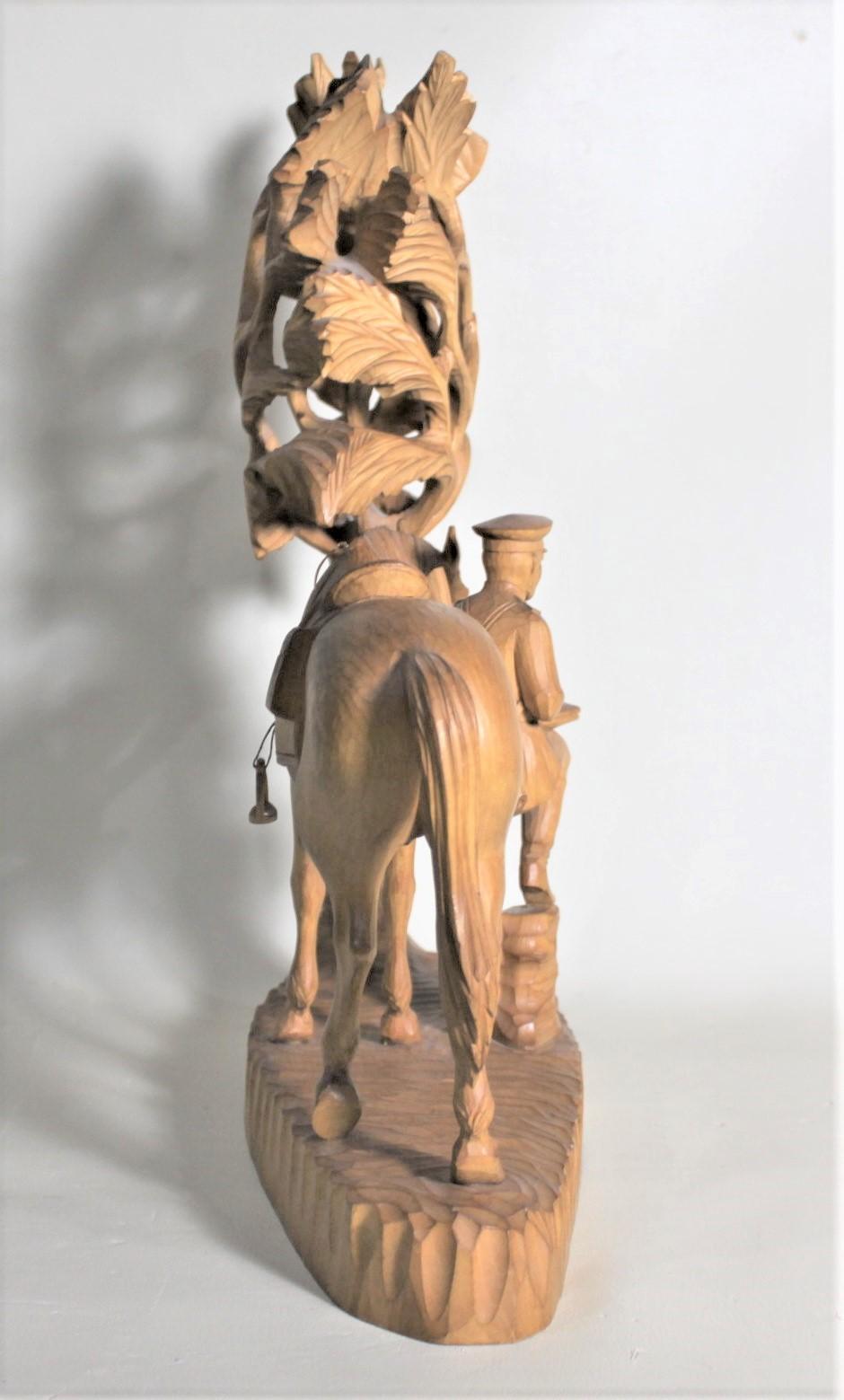 Hand-Carved Large Hand Carved Black Forest Military Soldier & His Horse Under a Shade Tree For Sale