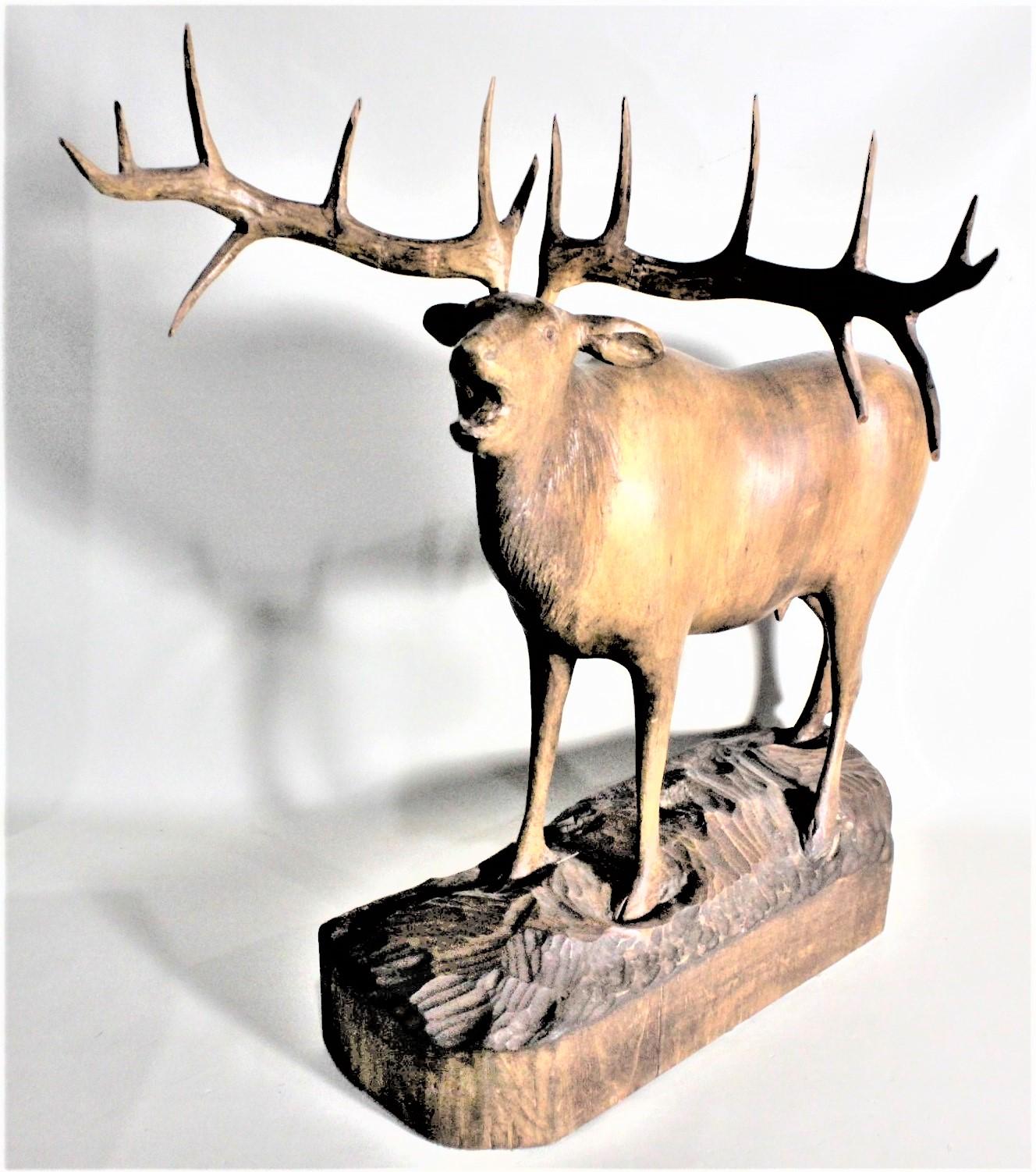 large wooden deer sculpture