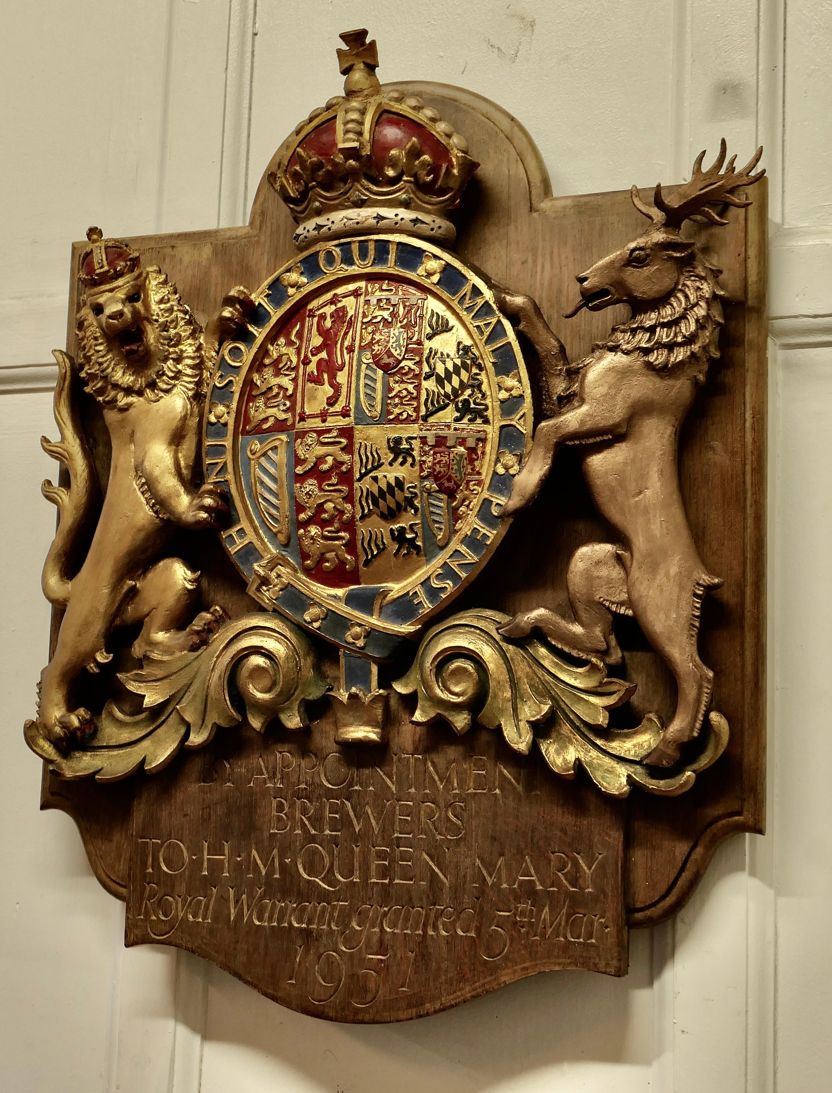 Large hand carved british royal coat of arms brewers wall plaque.


This is a very fine piece, it dates from the 1950s and is hand carved from solid oak and painted over gesso in gold and rich colours, it celebrates the Royal warrant granted to