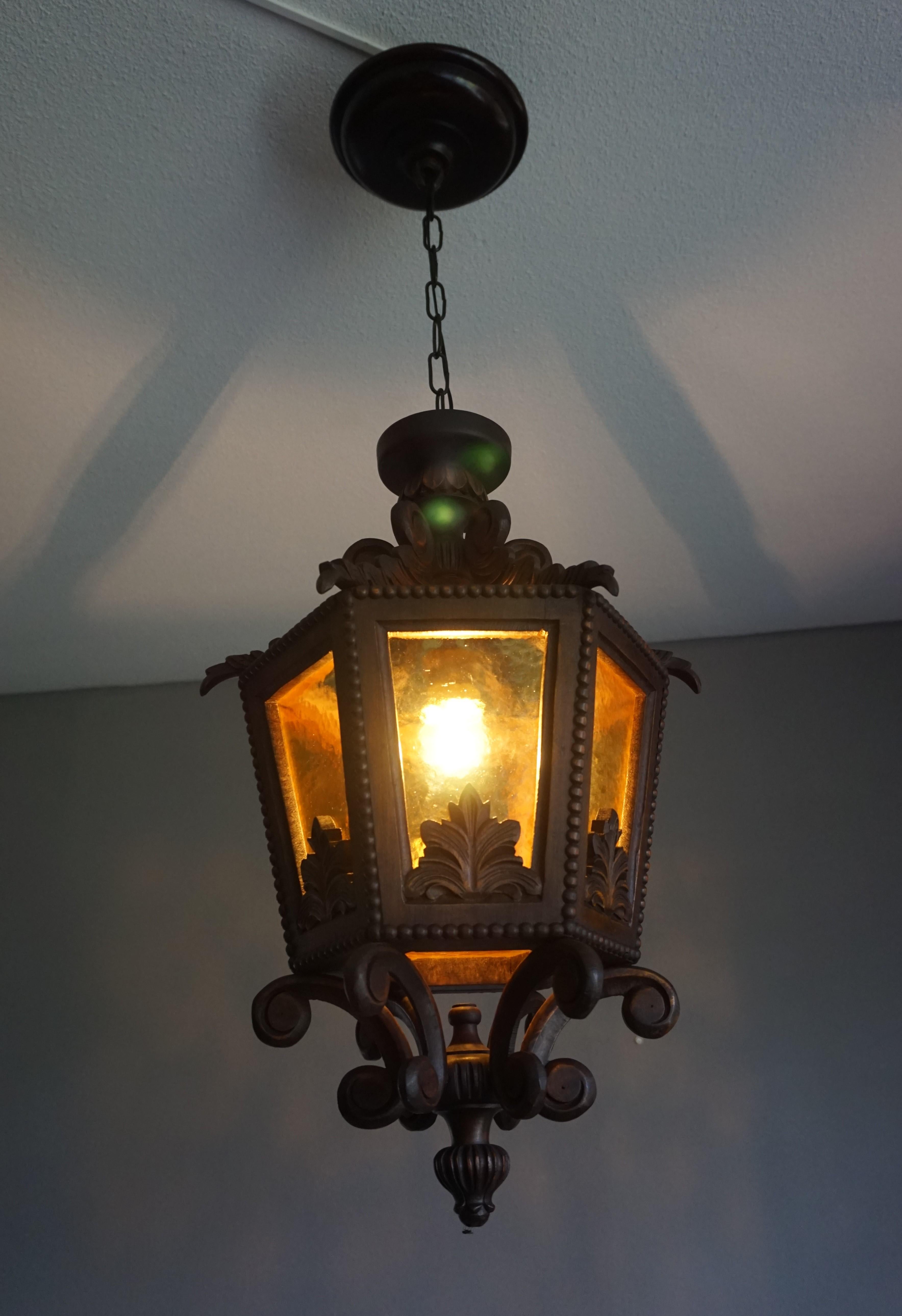 Large Hand Carved 20th Century Wooden Pendant Light with Amber Glass Panels In Excellent Condition In Lisse, NL