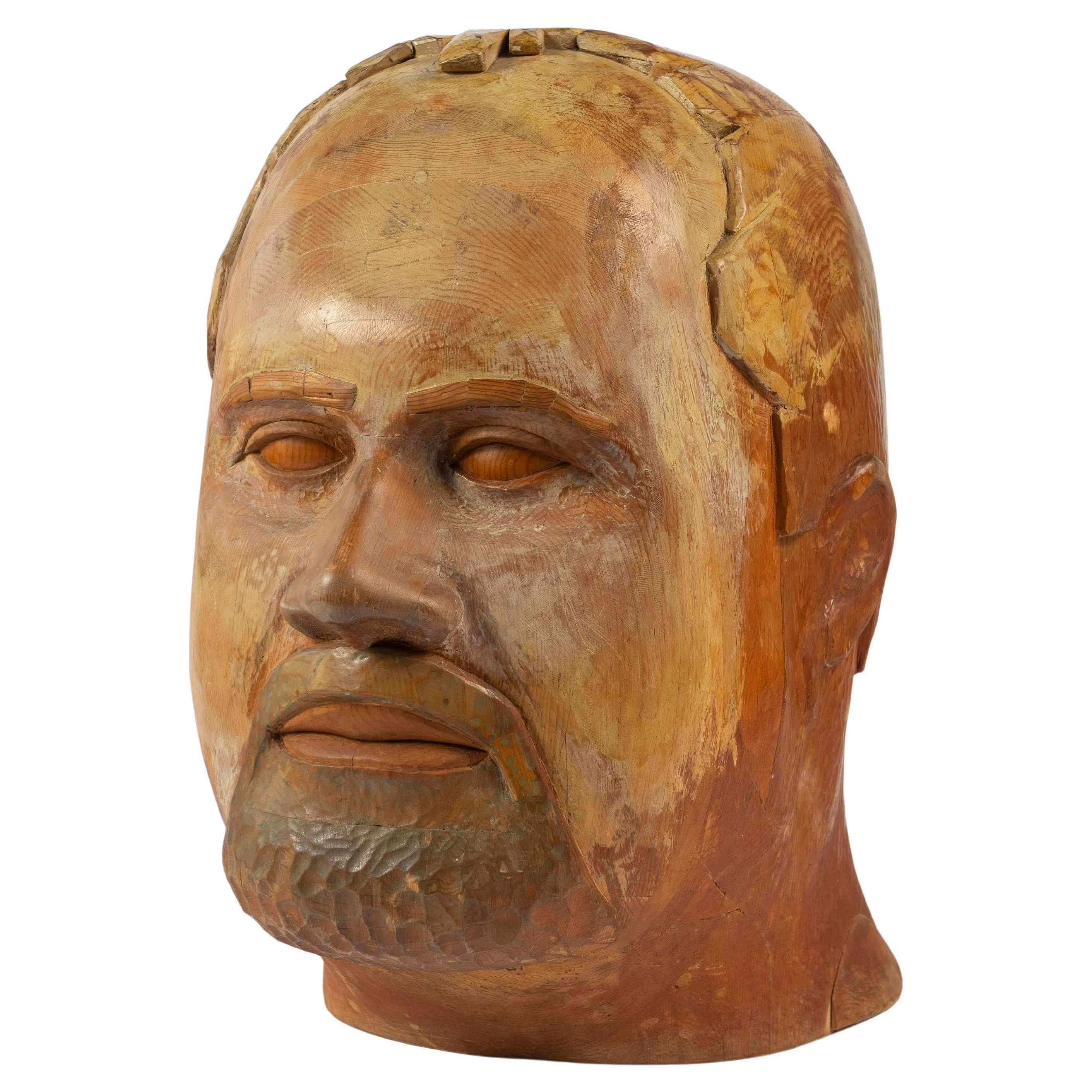 Grande sculpture d'art populaire sculptée à la main représentant une tête d'homme