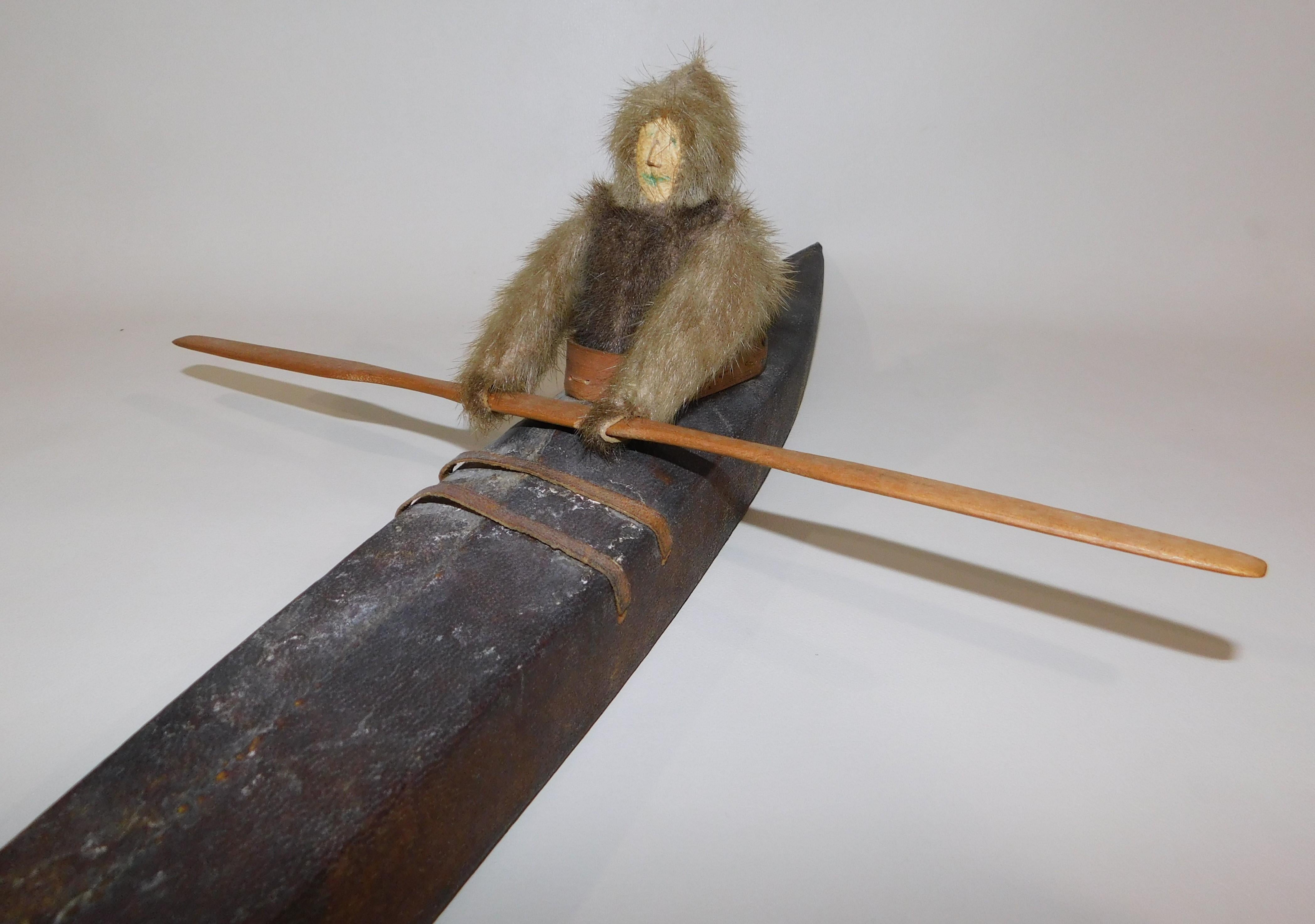 Large over 30 inches long, handmade Inuit Eskimo hunter travelling in a kayak. It has a hide stretched over wood on the kayak.

Kayaks are a technology that have a long history of use in the Arctic; they were an important part of subsistence and