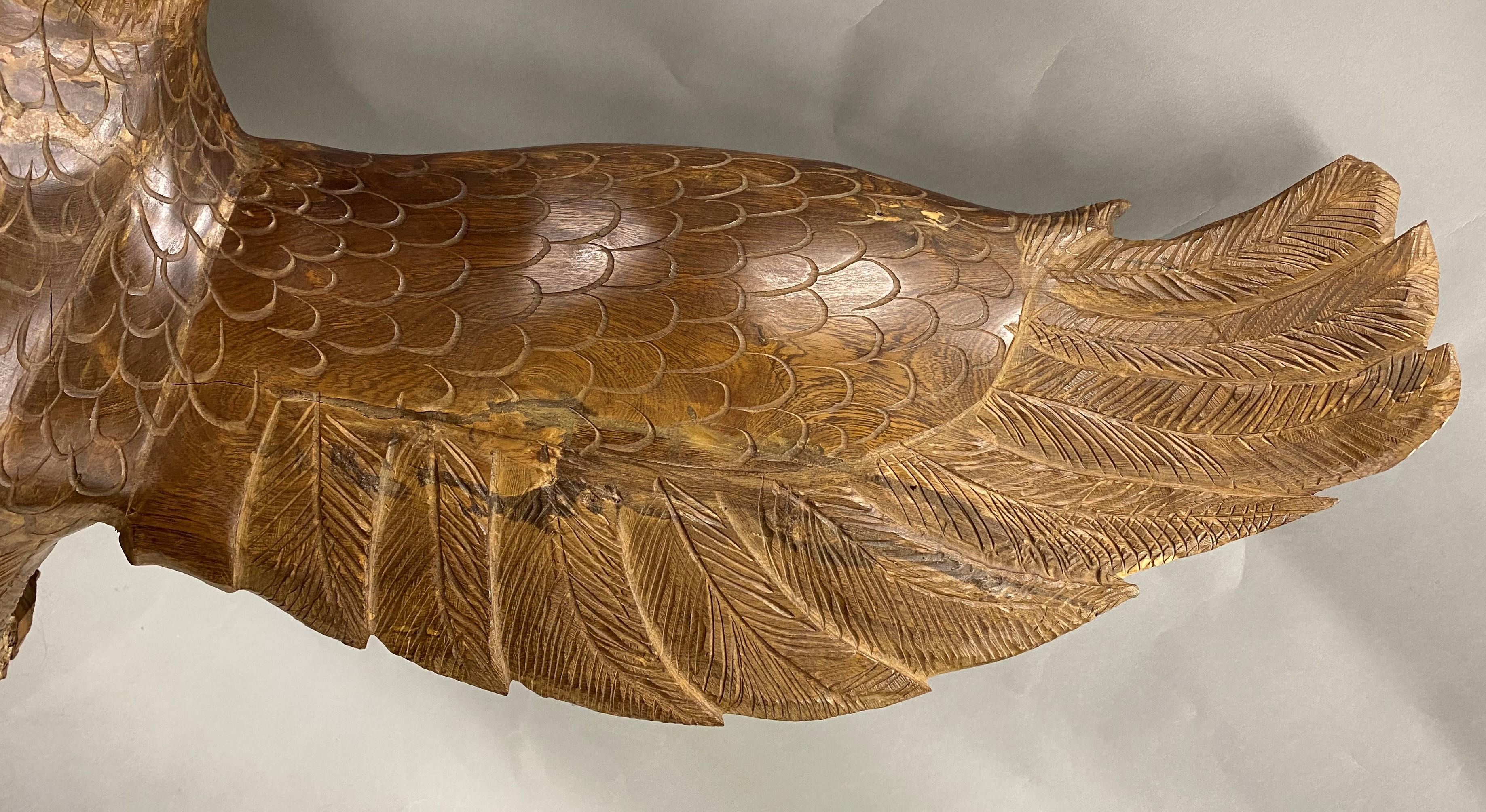 20th Century Large Hand Carved Majestic Ironwood Eagle with Full Wingspan