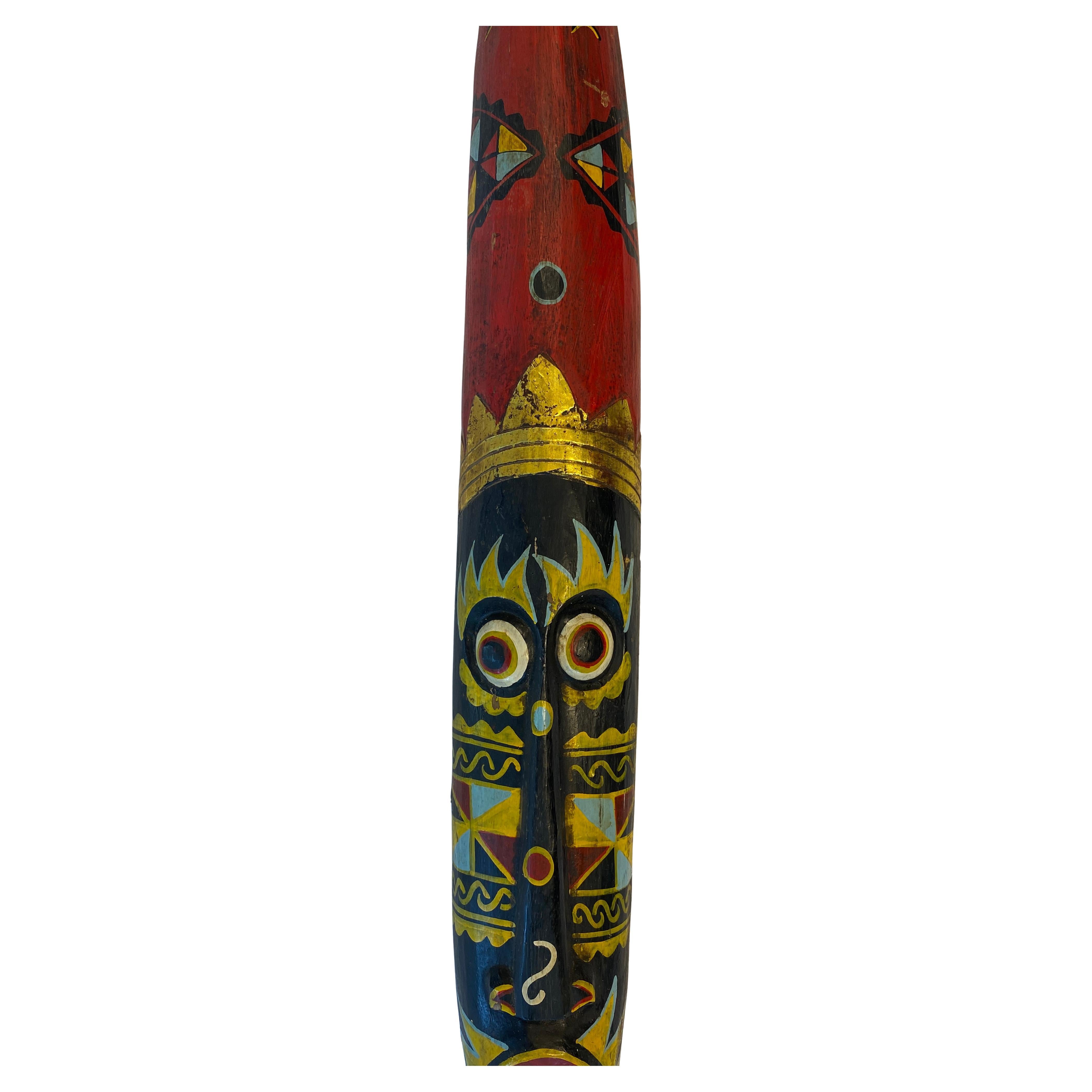 A generously sized wooden tribal mask. 

Hand-carved and painted this decorative mask that would look great in a western or country themed setting. 

Measures: 39