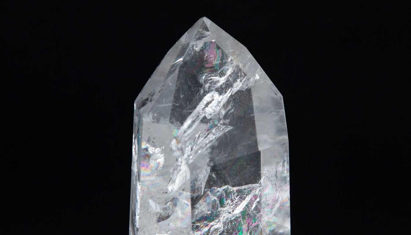 Large hand carved rock crystal point. Measures: 4