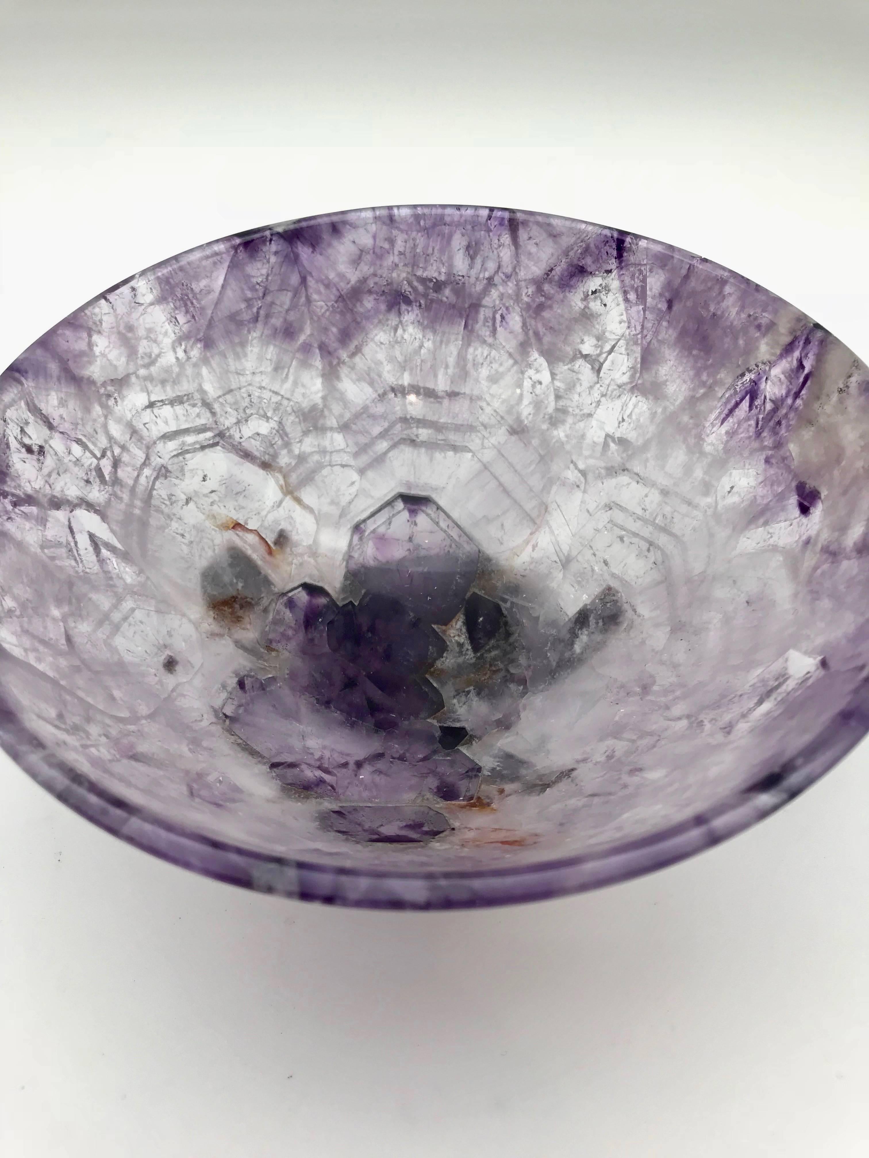 Hand-carved and polished out of a solid piece of semi-precious amethyst gemstone. This 6