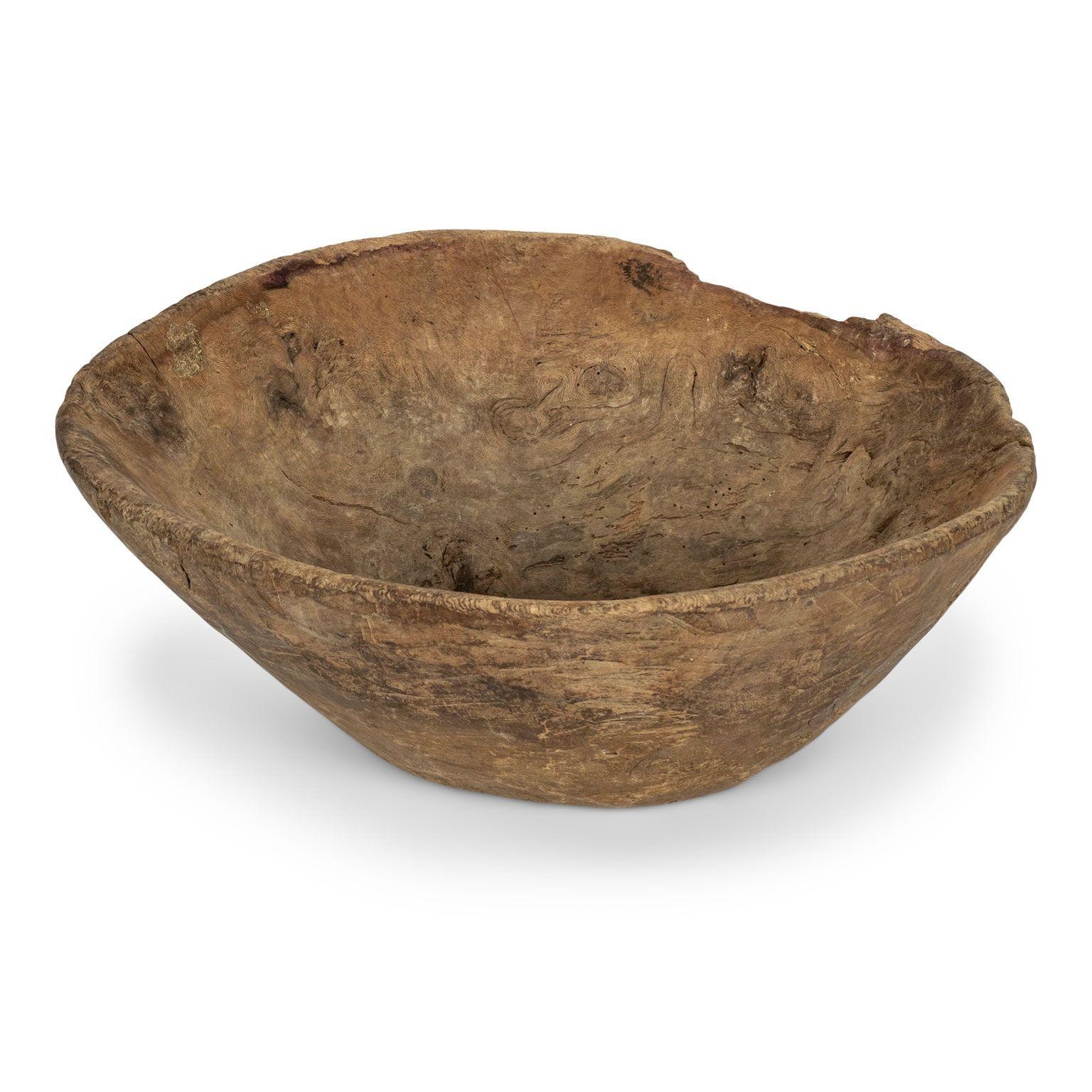 Large hand-carved Swedish root bowl dating to the 19th century. Irregular live-edge and beautiful patina.