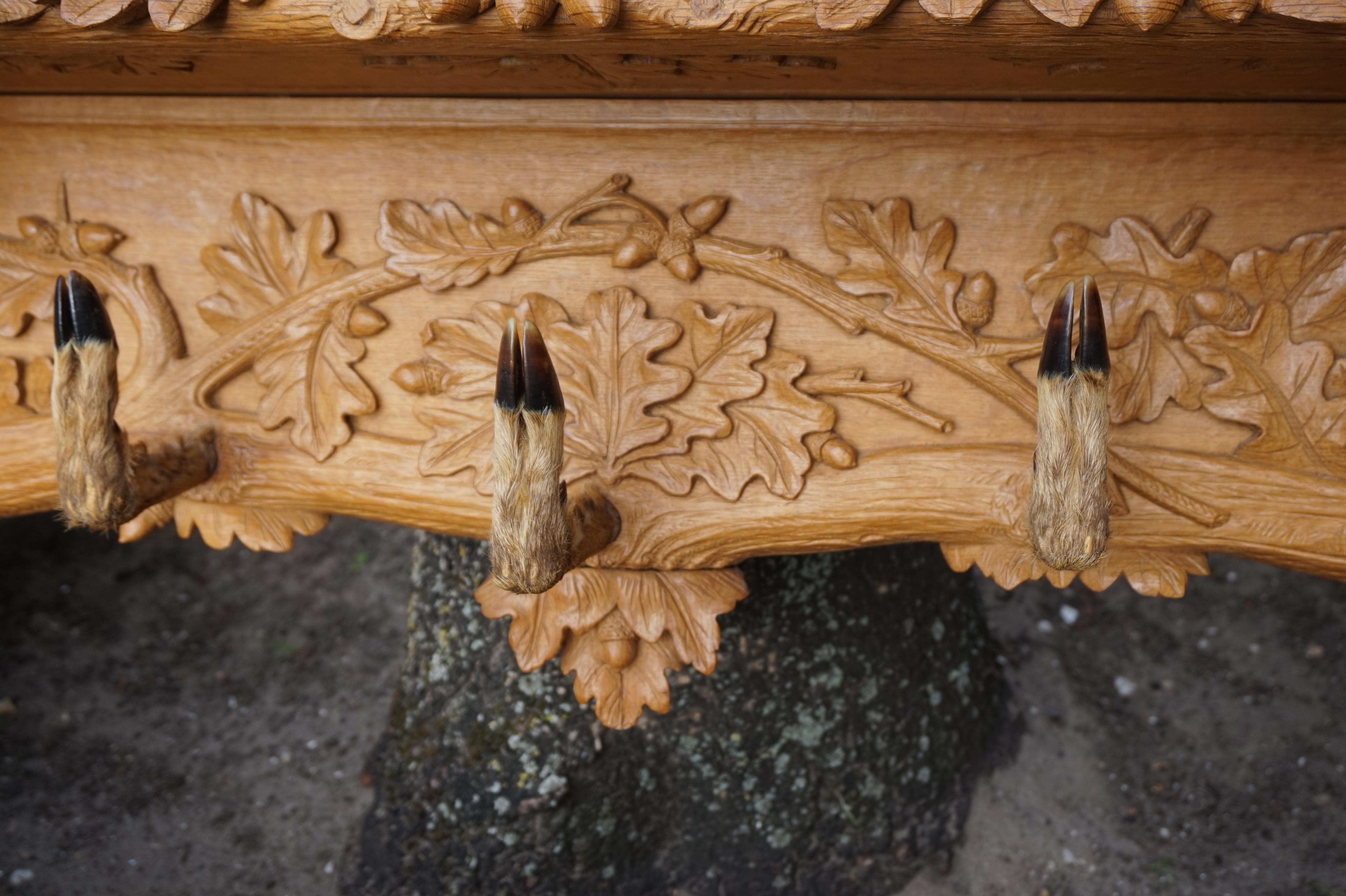 Large Hand-Carved Swiss Black Forest Coat Rack by N. Deneffe w. Deer Hoof Hooks In Good Condition In Lisse, NL