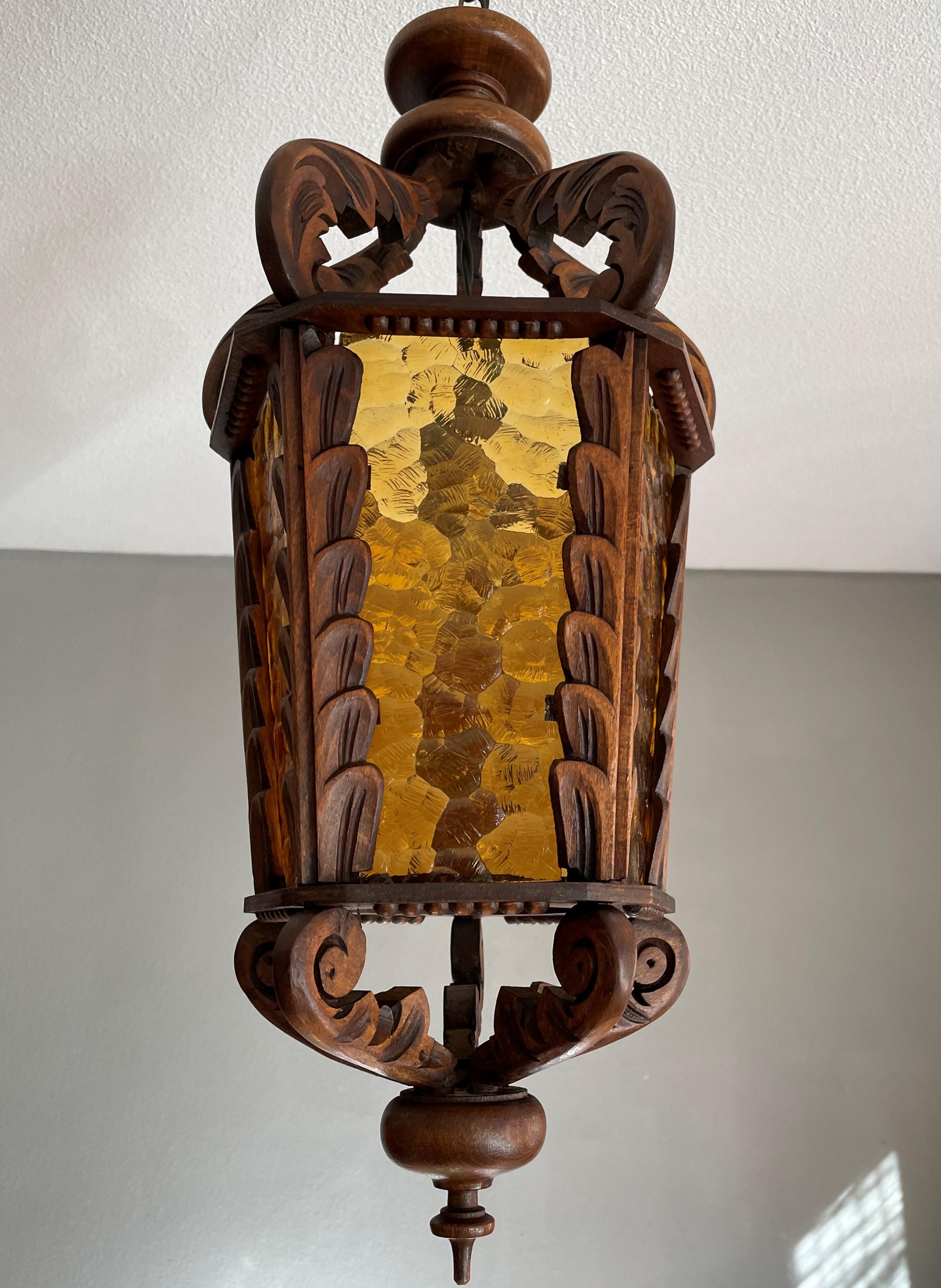 Hand-Carved Large Hand Carved Vintage Wooden Pendant Light / Lantern with Amber Glass Panels For Sale