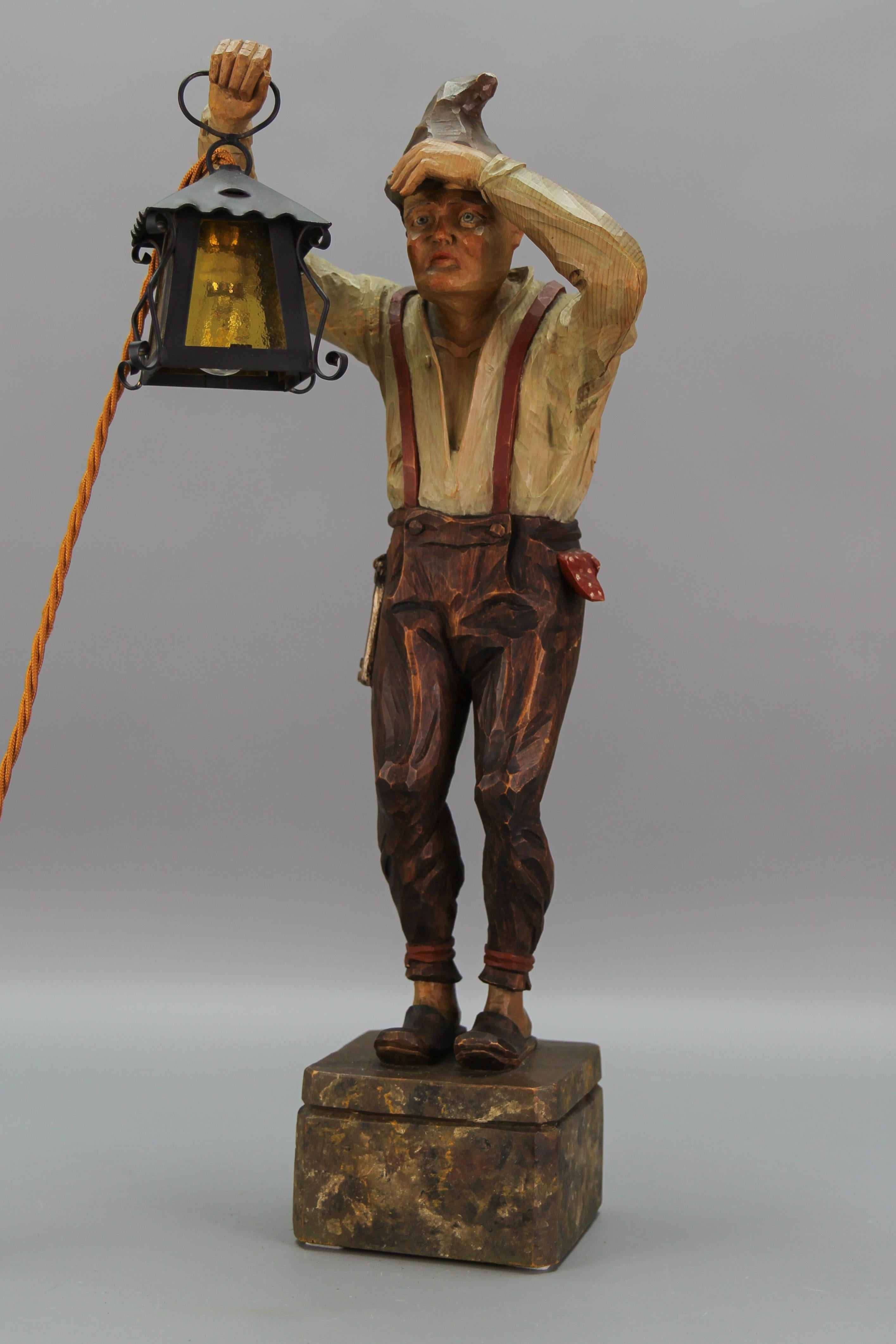 Large figural hand-carved wooden lamp, sculpture - man with a lantern, Germany, circa the 1930s
An impressive and unique sculpture of a man with a lantern in his hand. Masterfully hand-carved and hand-painted linden wood.
One socket for E14 size