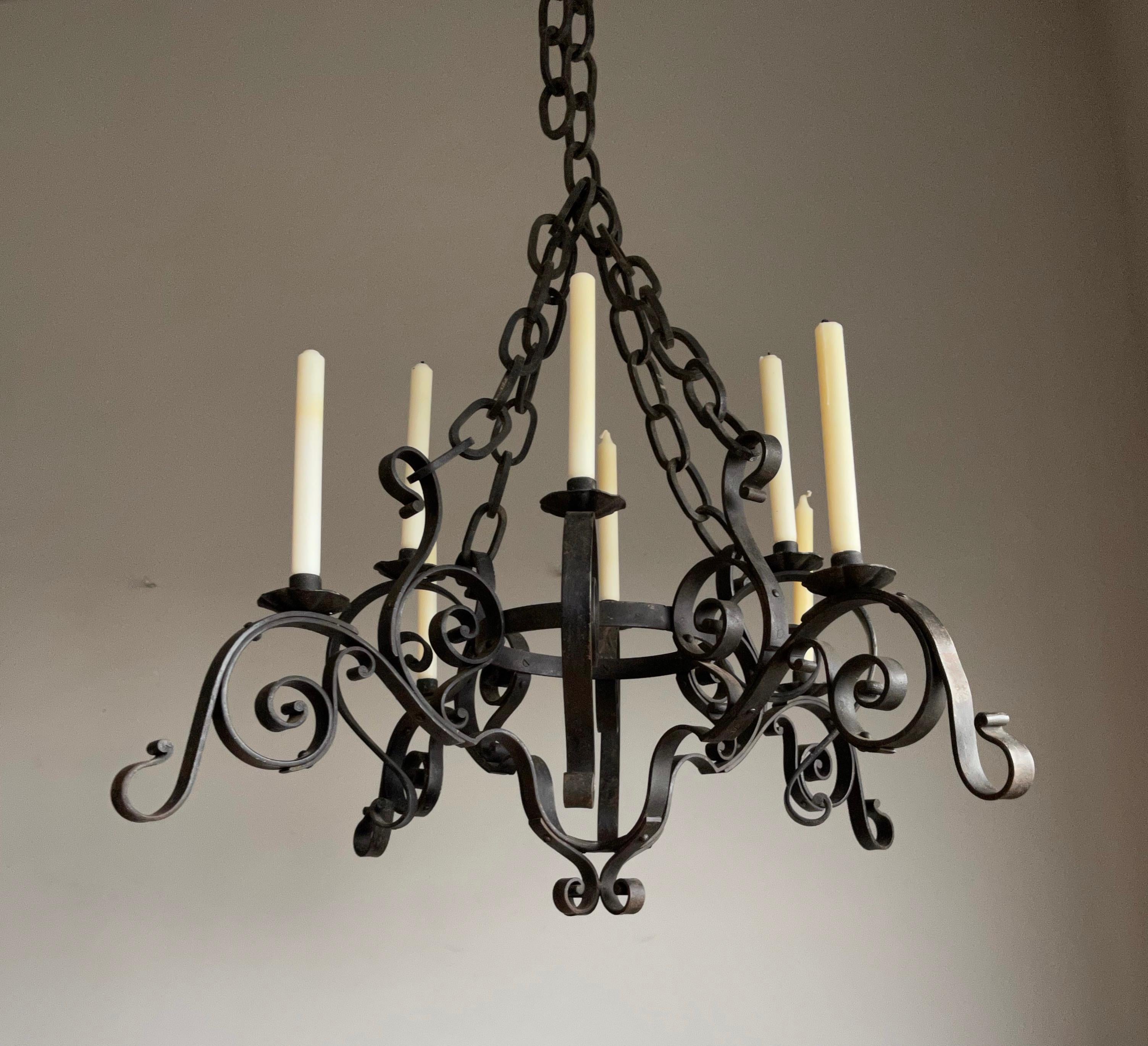 Museum quality, forged in fire, Medieval castle-design chandelier.

This excellent quality AND condition pendant is all hand-forged and its design and perfect execution lifts it above the average, to say the least. It remains a mystery to us, how on