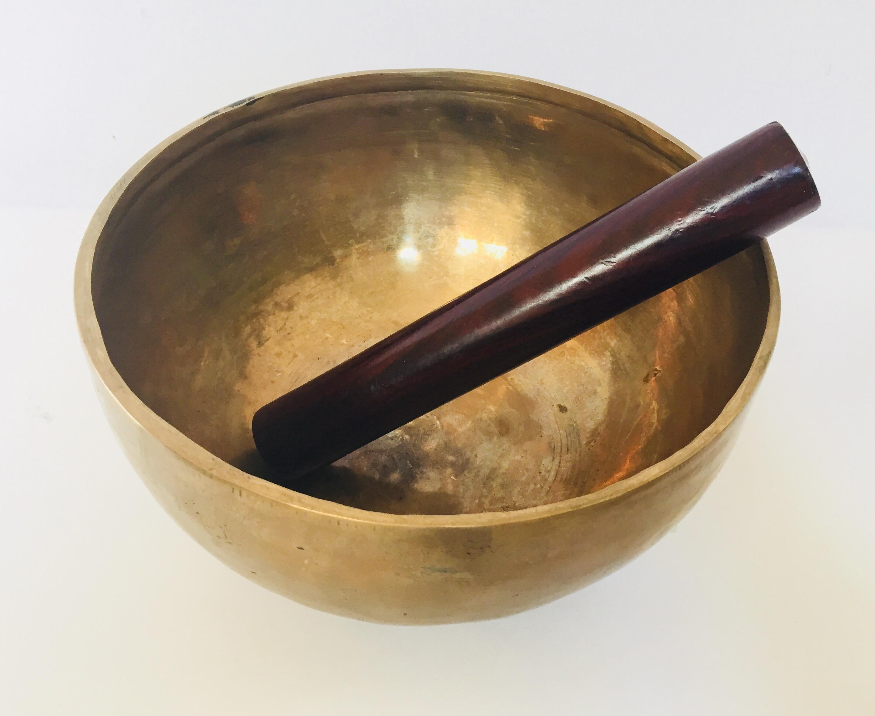 Large hand-hammered Tibetan brass bowls are used in some Buddhist religious practices to accompany periods of meditation and chanting.
They have become popular with music therapists, sound healers and yoga practitioners.
The singing bowl is used in