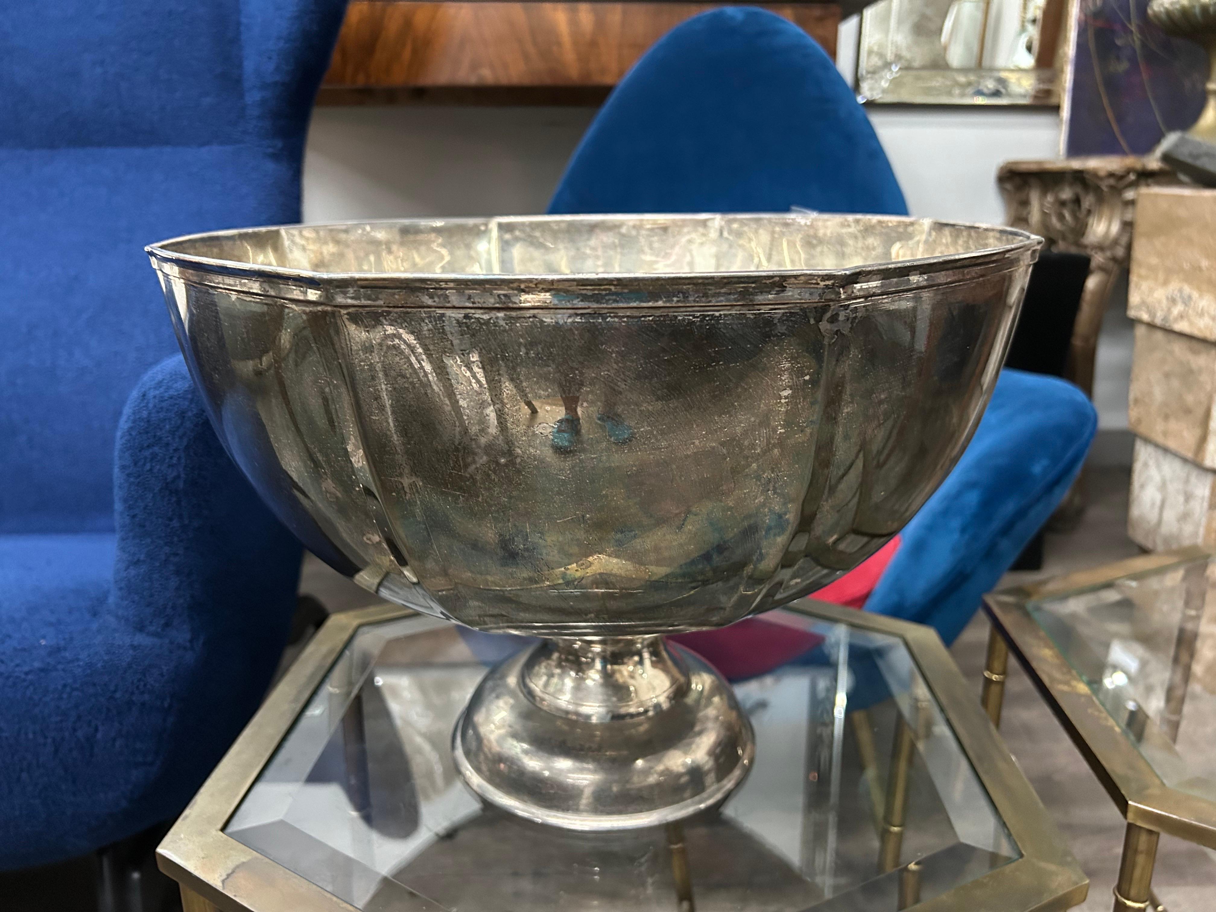 Large hand hammered Buccellati style silver plated bowl. This lovely hand made silver plated bowl has a scalloped modernist or Art Deco design with a hand hammered finish. This beautiful decorative bowl or punch bowl would make the perfect