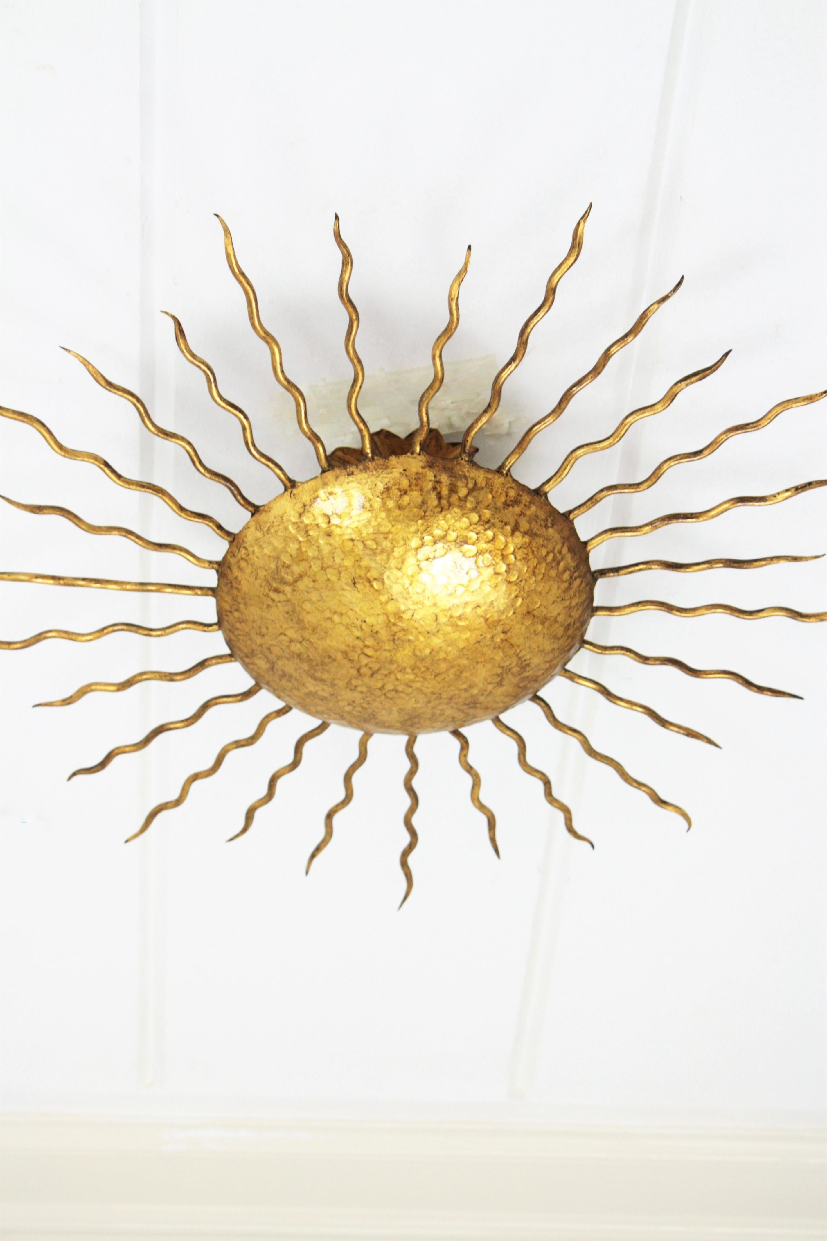 Spanish Large Hand-Hammered Gilt Iron Sunburst Flush Mount or Wall Light, Spain, 1950s