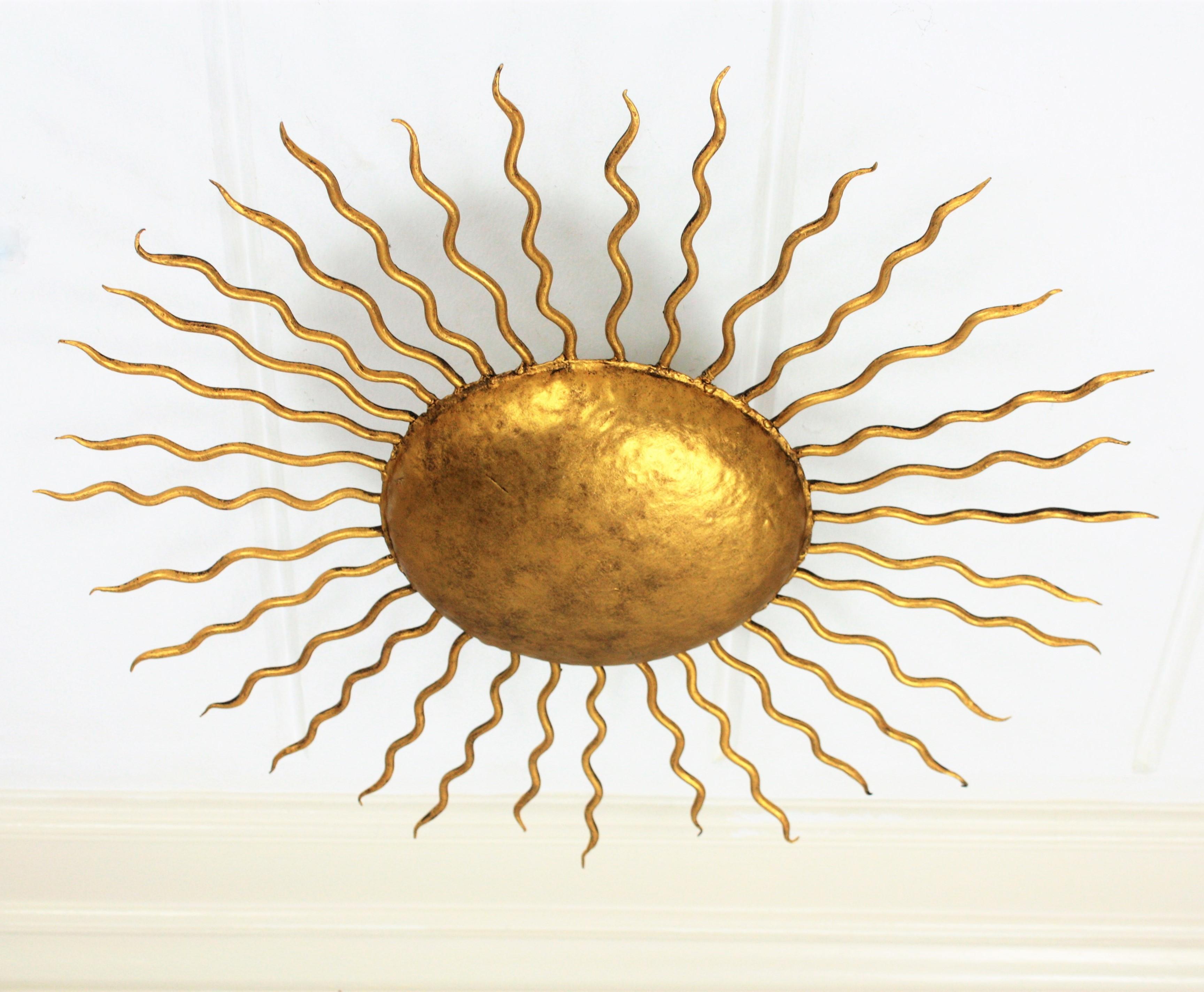 Large Hand-Hammered Gilt Iron Sunburst Flush Mount or Wall Light, Spain, 1950s In Excellent Condition In Barcelona, ES