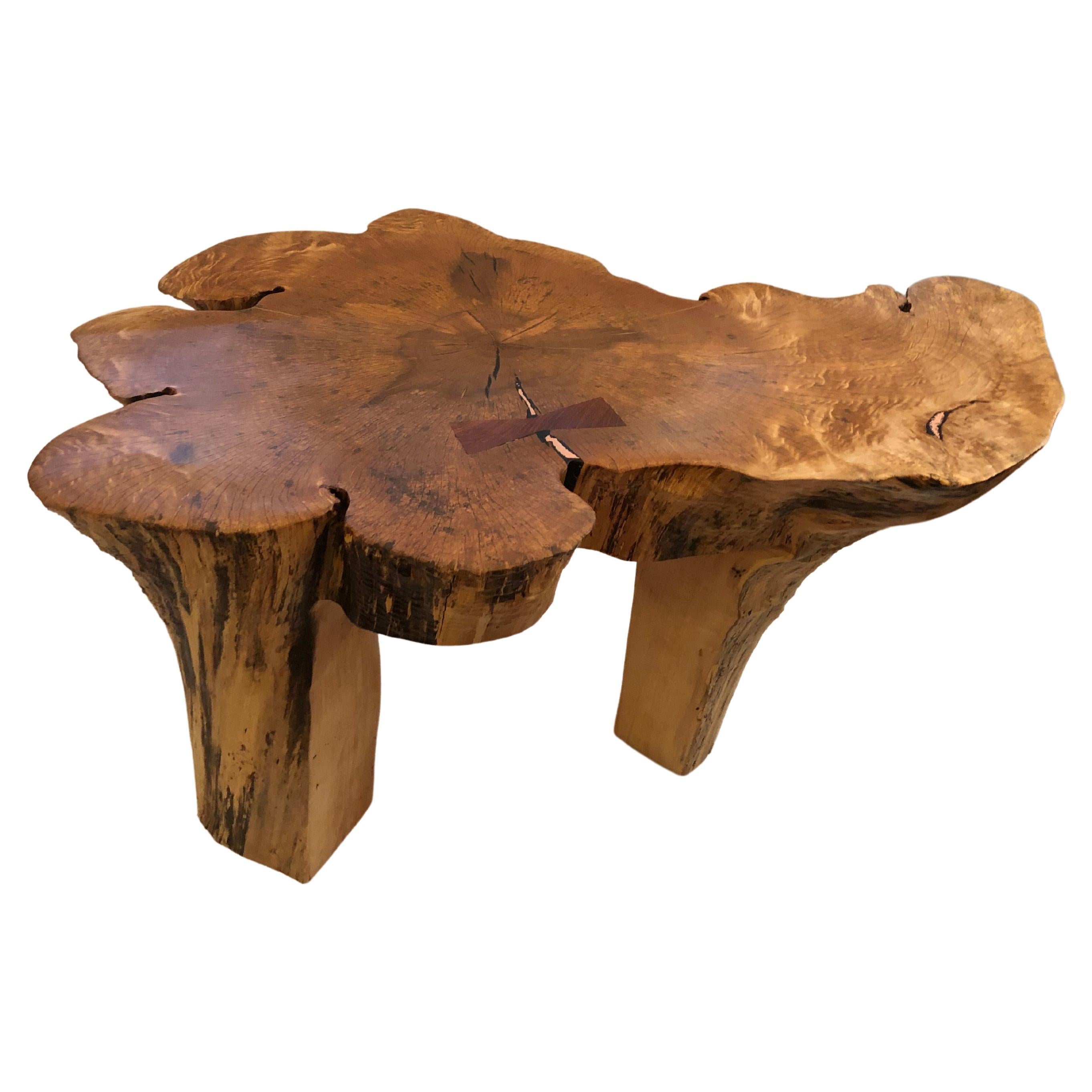 A hand made work of art by NJ wood worker John Braun. This large organic modern amoeba shaped coffee table is made from the salvaged base of a maple tree from the artist's own backyard. The lengthy process includes months of drying the wood and
