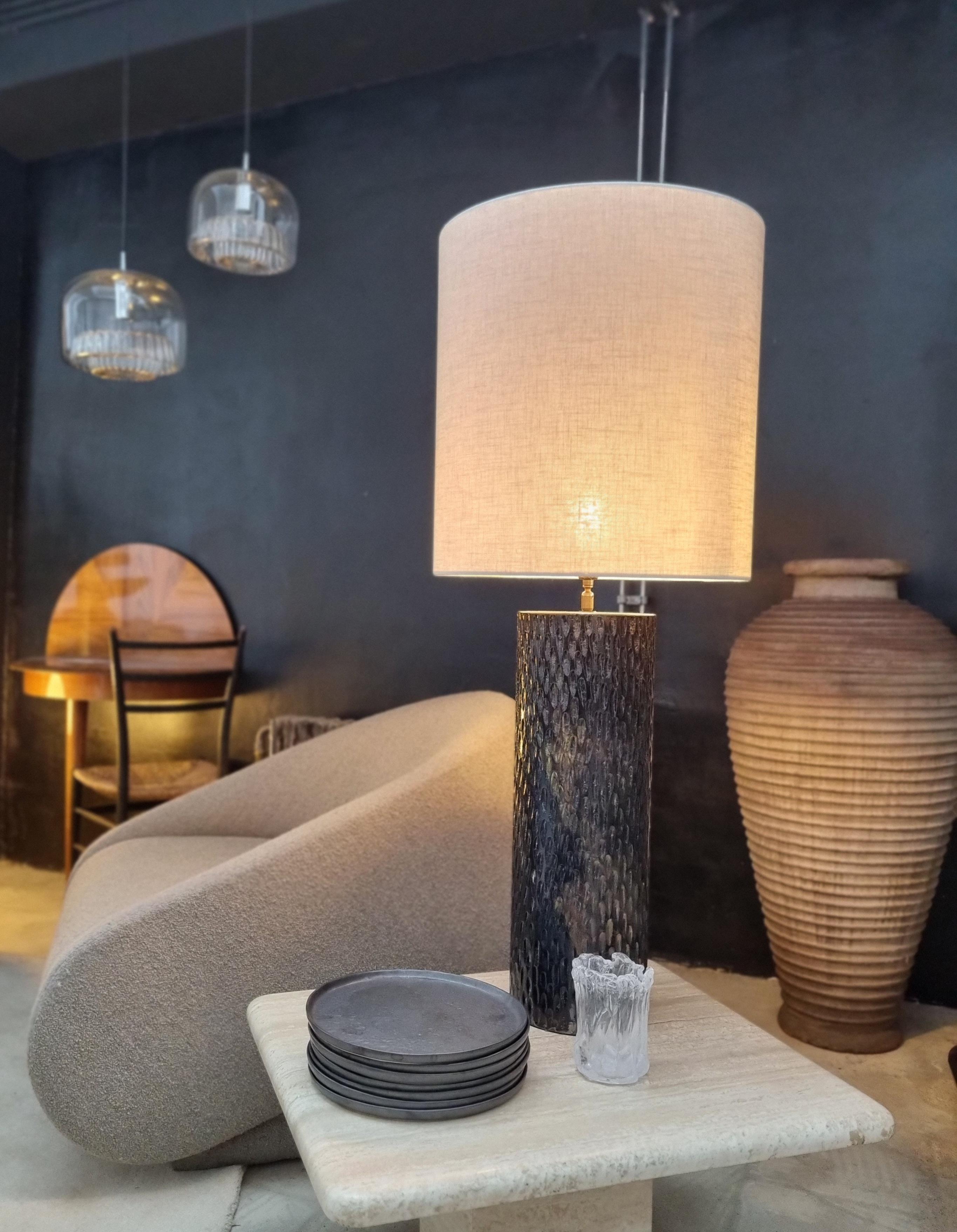 This Cylinder lamp is hand made in The Netherlands with love and respect for people and the planet. Therefore all materials used are as close to nature as possible.

The ceramics are fired using some basic principles of the technique generally