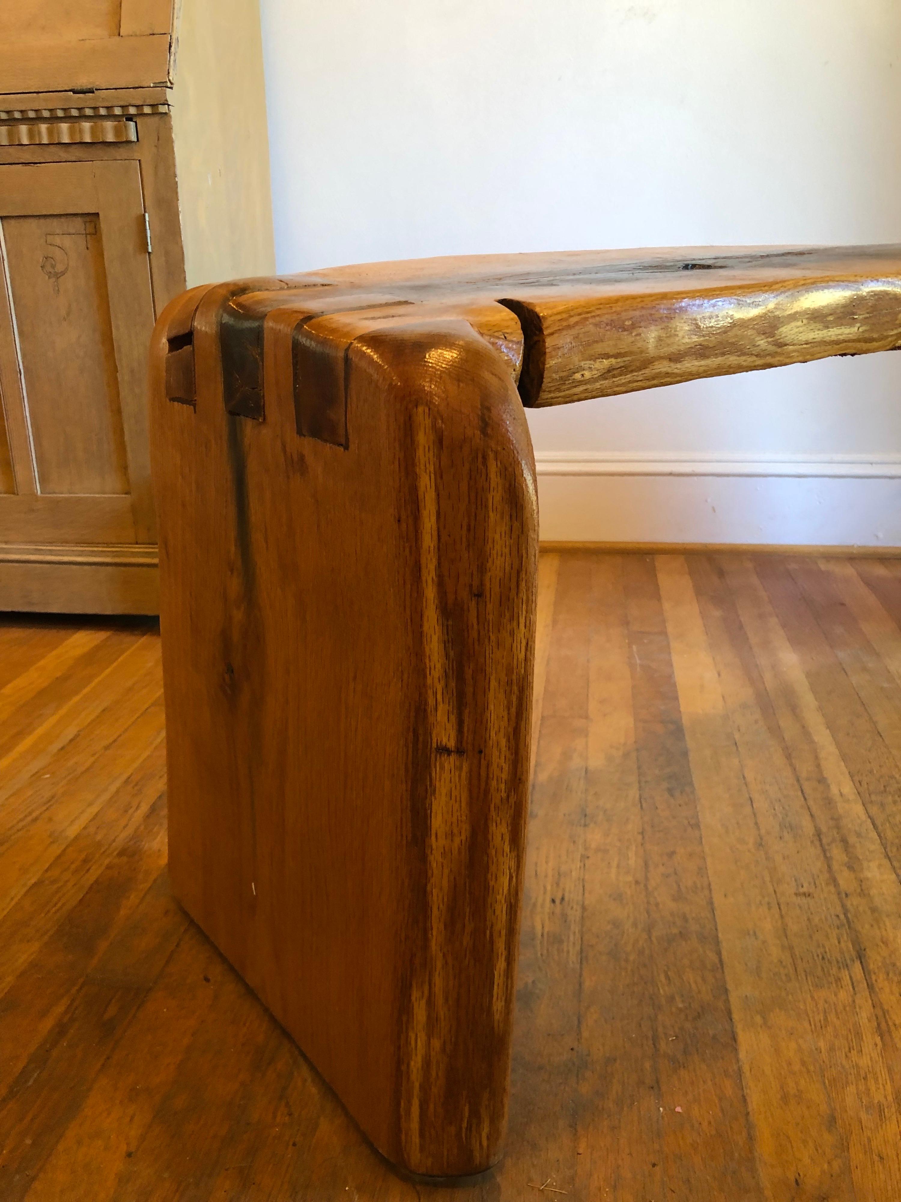 Solid hand made live edge bench from North Carolina Artisan. Modern curved lines with natural aged and unique solid wood.
Could also be used as a coffee table.