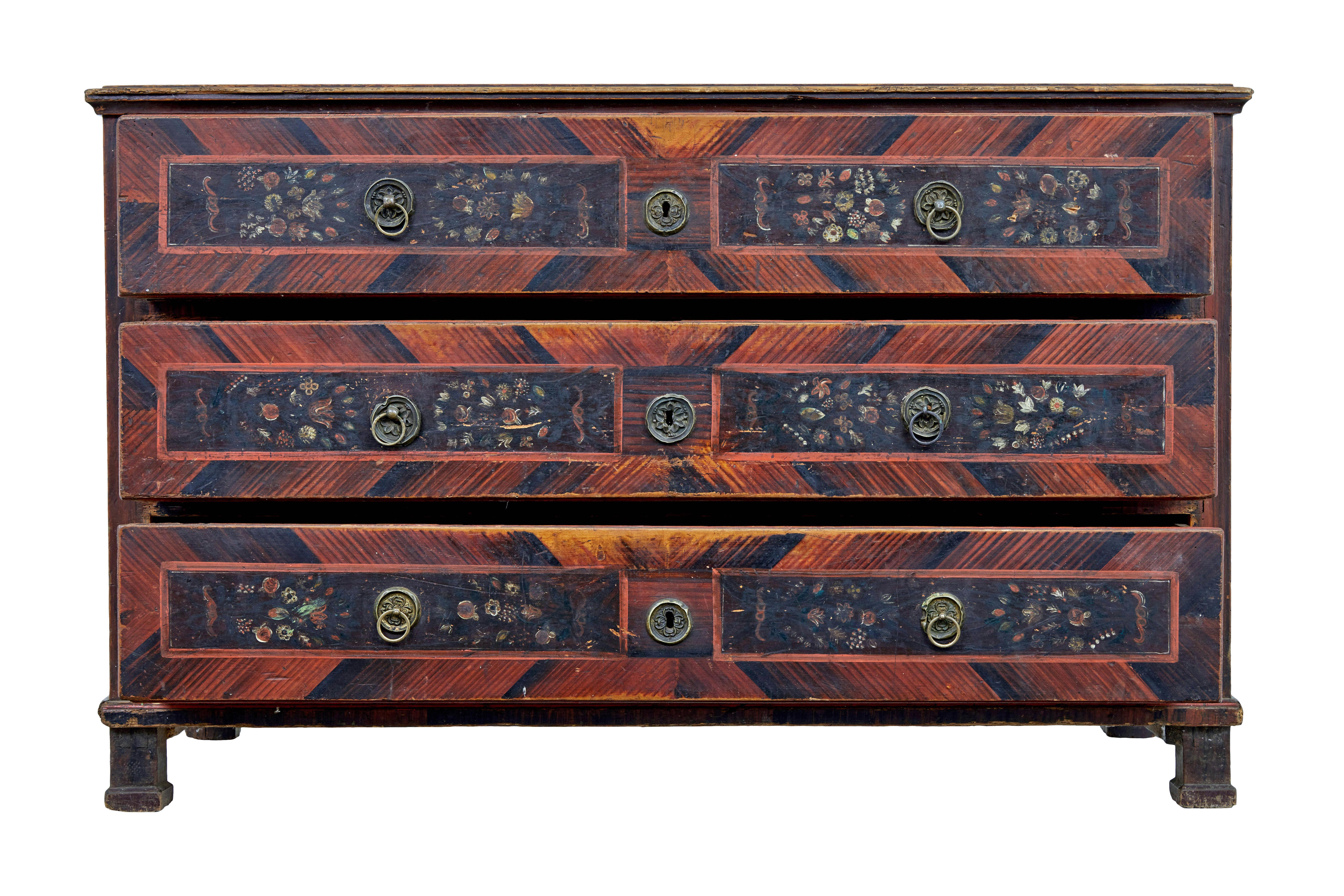 Large hand painted 19th century chest of drawers circa 1820.

Substantial european pine chest of drawers quite possibly from hungary.

Hand painted in a black and red tonal colour scheme, the paint dates from around the time of application which is