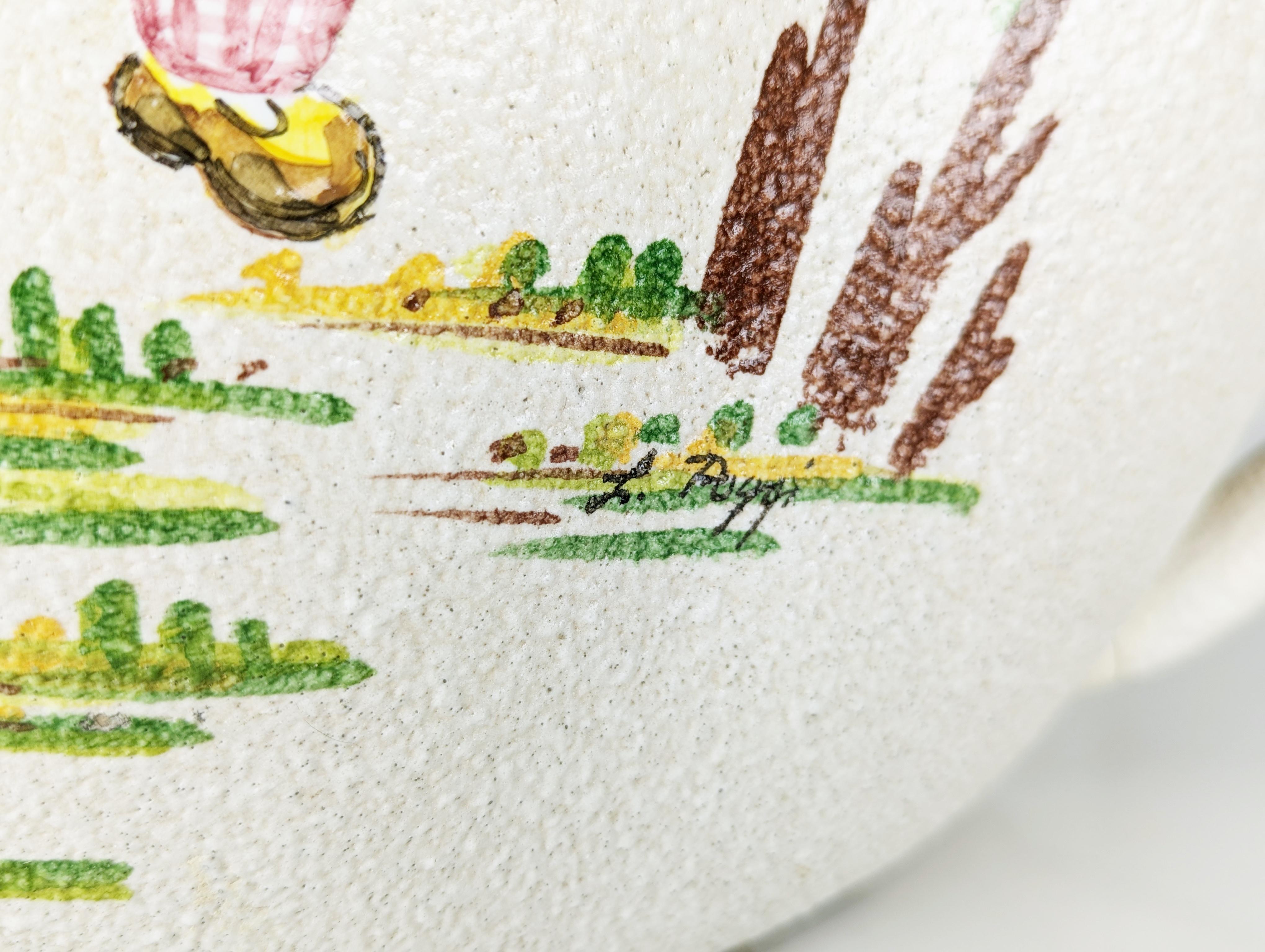 Large handmade ceramic vase, produced in Italy between the late 1940s and early 1950s by the prestigious ceramic factory CE AS of Albisola, Italy.
The vase is hand-decorated on both sides by decorator Lina Poggi Assalini who worked at the factory