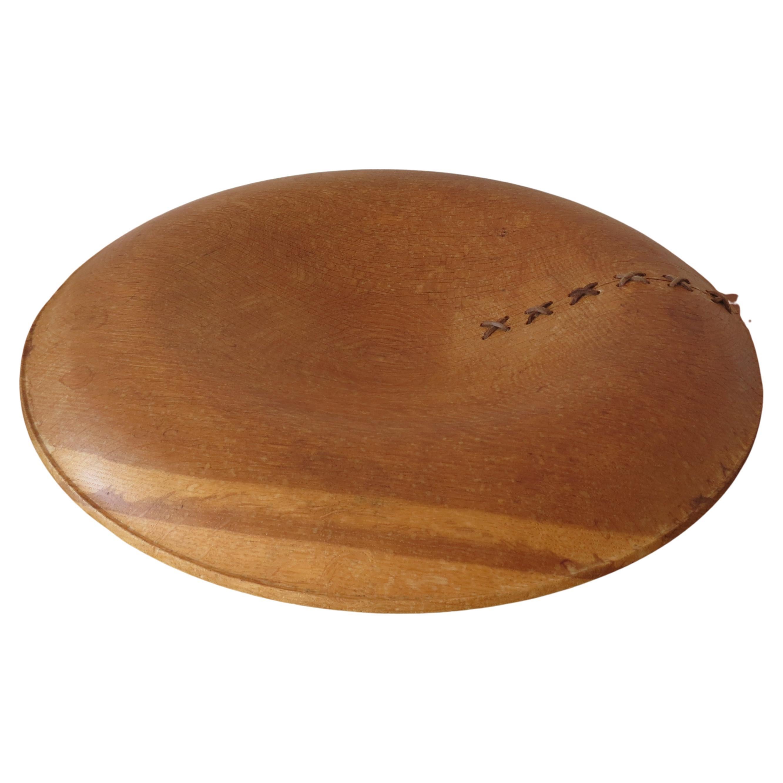 Wonderful hand turned large wooden bowl, made from solid Oak. Very nice fluid shape, stamped to the underside 