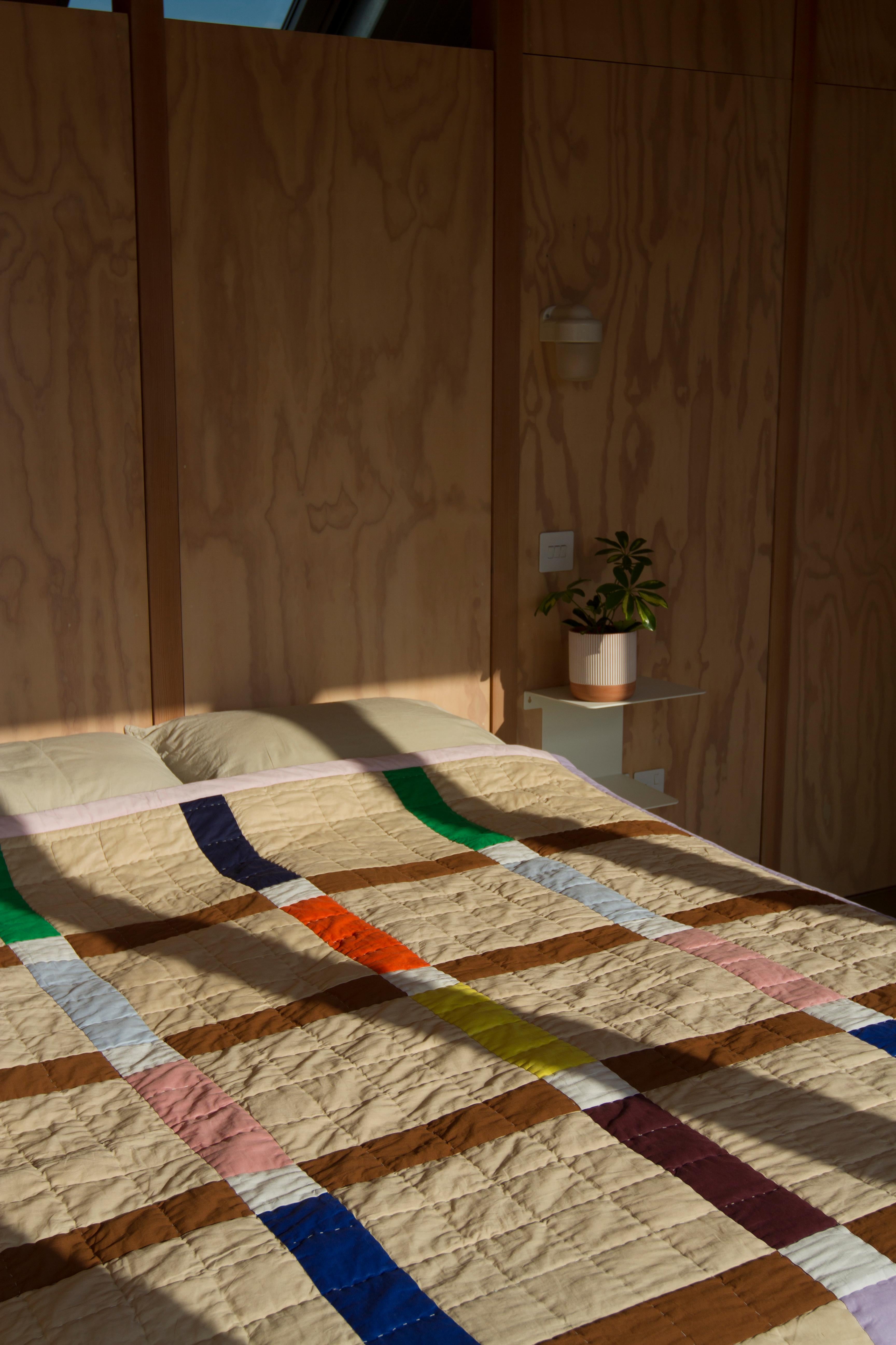 'Large grid' hand made quilt

100% Organic cotton quilts hand made in short runs by a small family run artisan studio in India. Made using GOTS certified fabric which is screen printed using AZO free water based non toxic inks. Hand made by