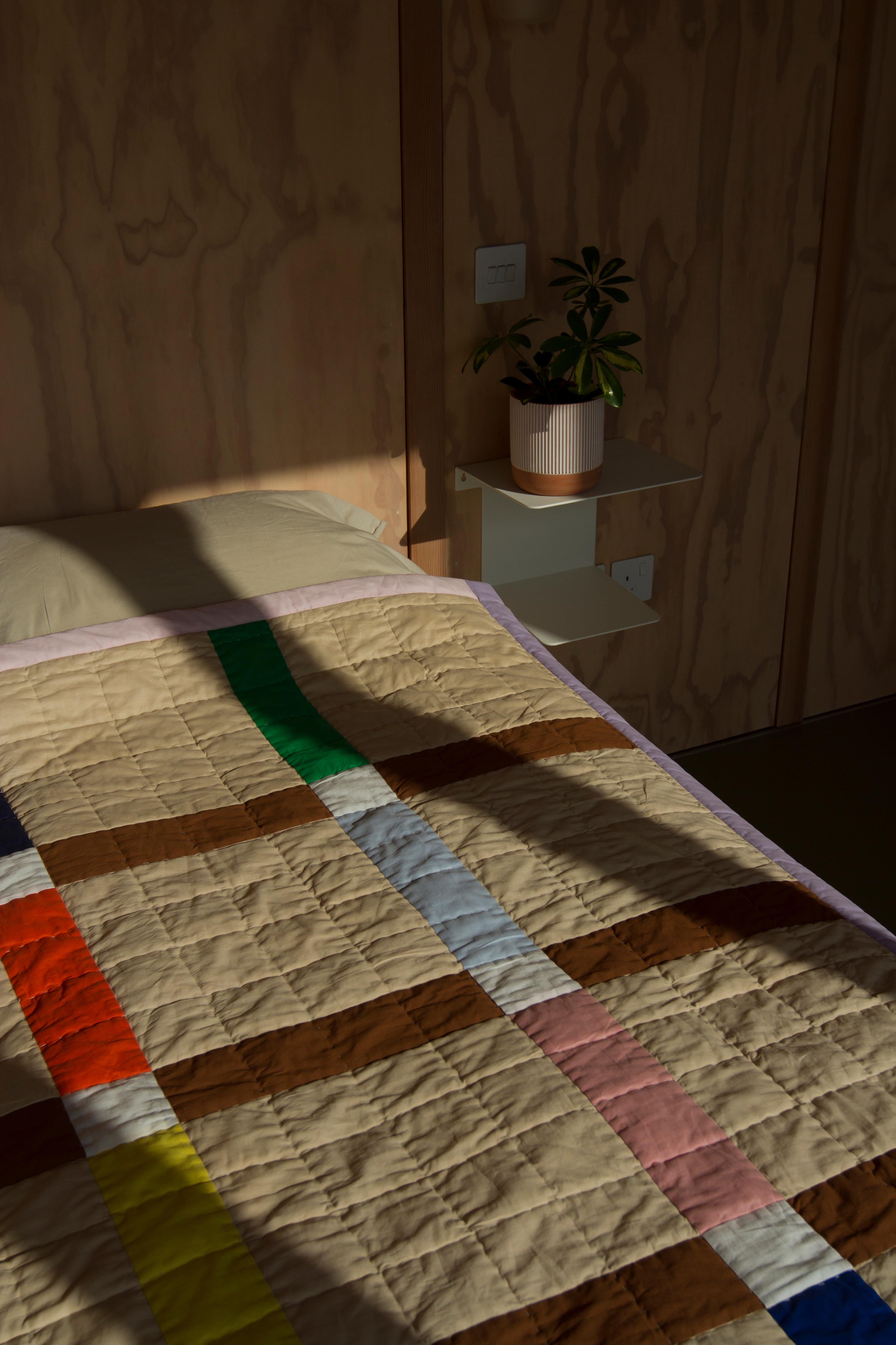 Cotton Large hand quilted patchwork bed quilt made from organic cotton For Sale