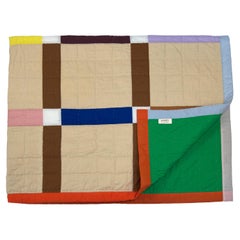 Large hand quilted patchwork bed quilt made from organic cotton