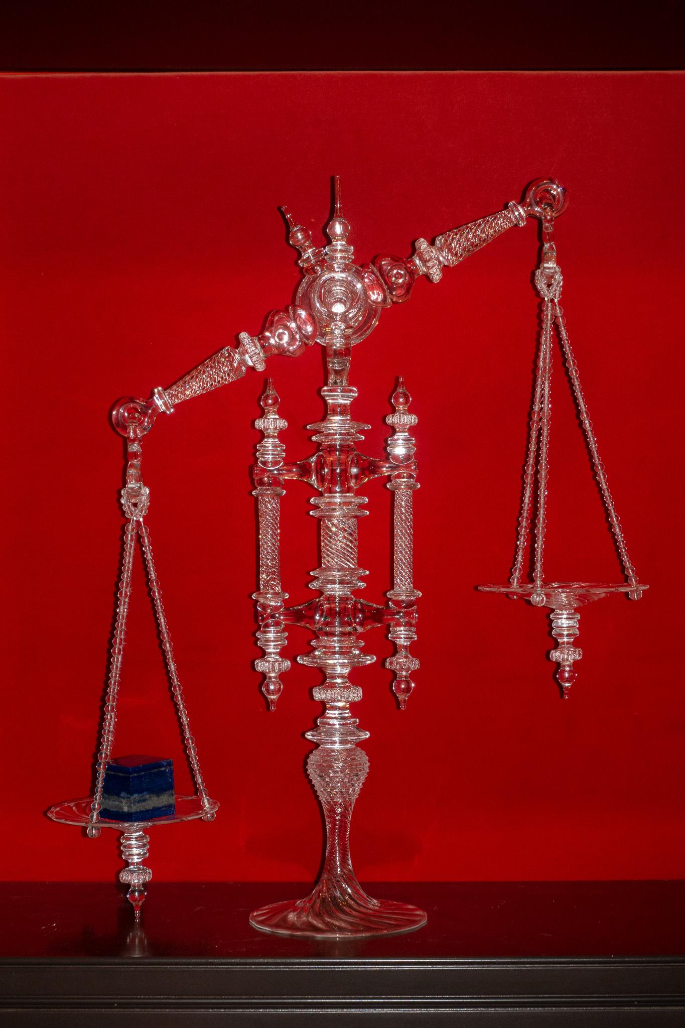 Handblown glass balance scale by Andy Paiko. The balance is accurate to within one gram. Part of a very limited series, each instrument varies significantly in detail and complexity, making each one unique.

Artist Andy Paiko works to examine the