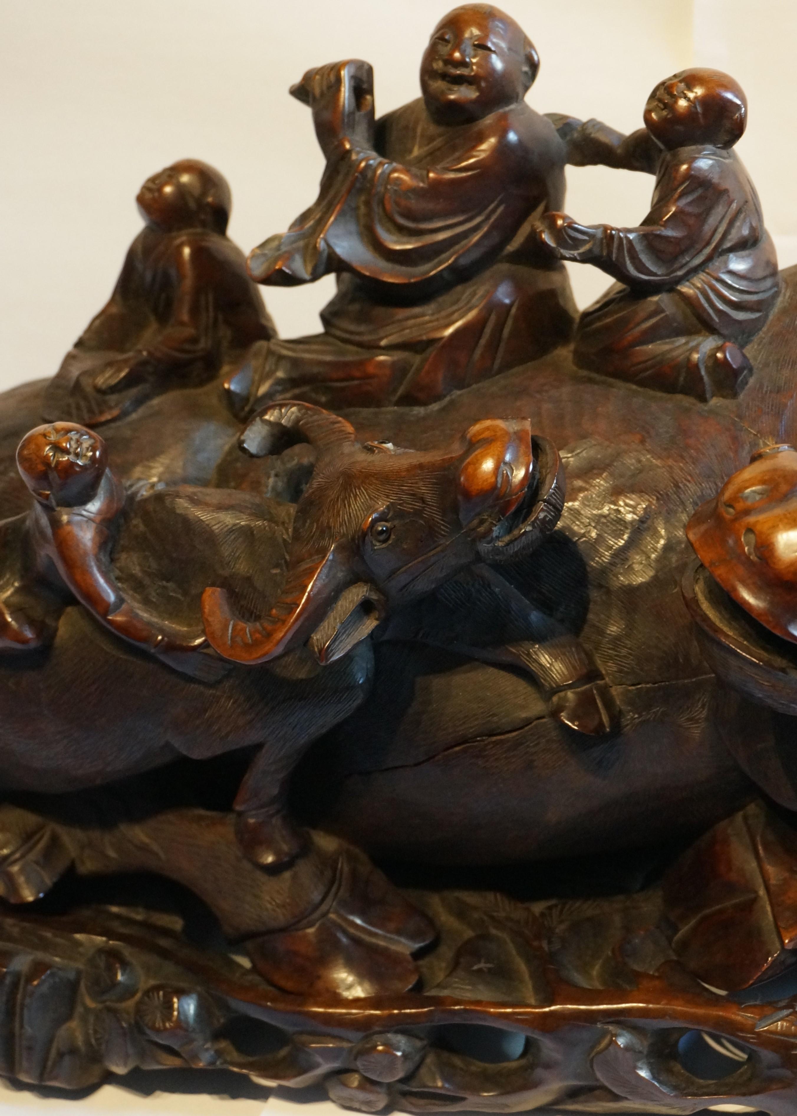 20th Century Large handcarved Asian wooden sculpture of a water buffalo with calf and figures For Sale