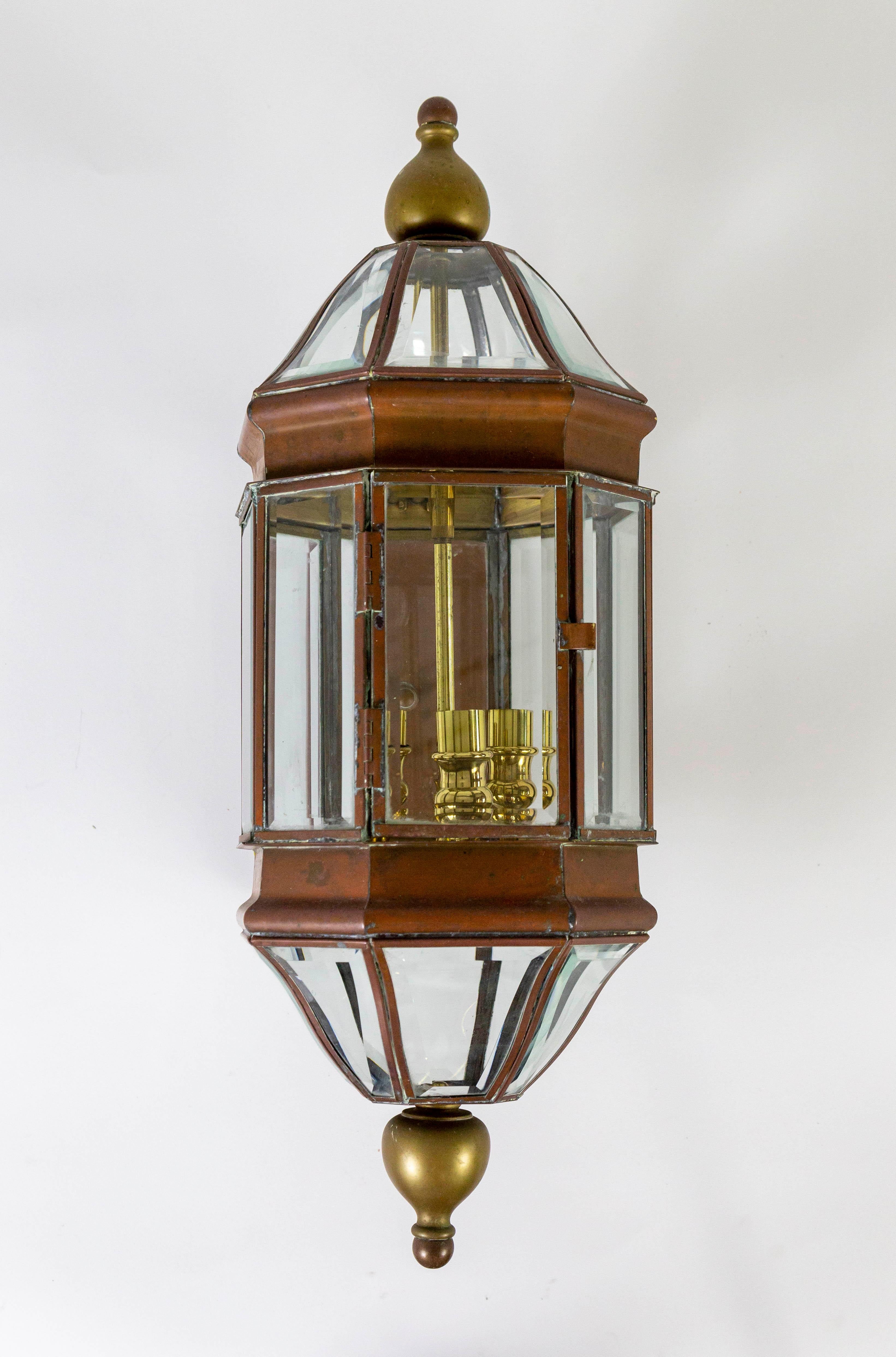 brass and glass lantern wall lamp